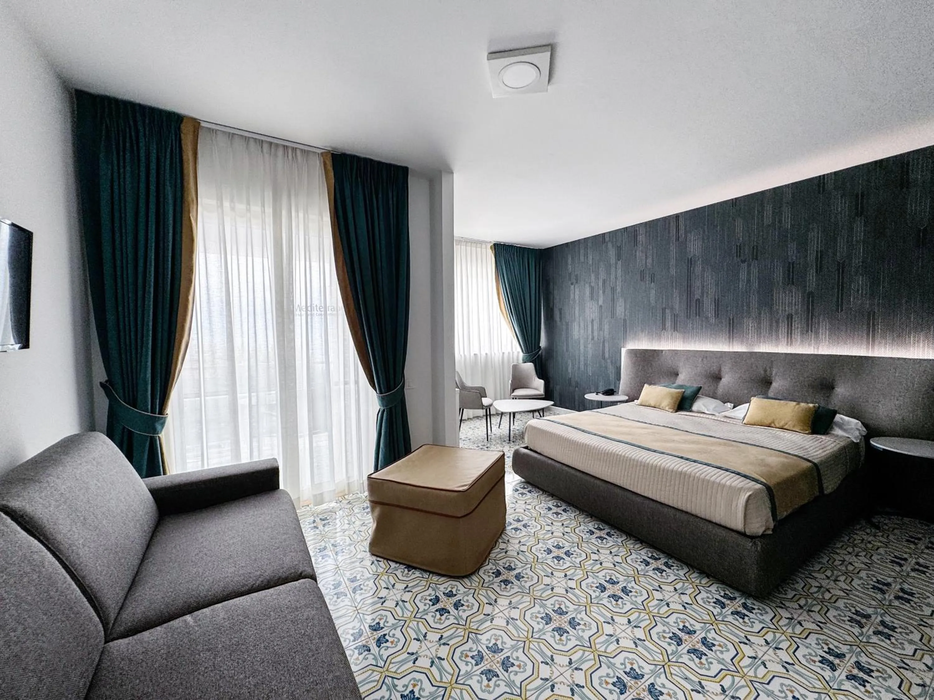 Photo of the whole room, Bed in Mediterranea Hotel & Convention Center