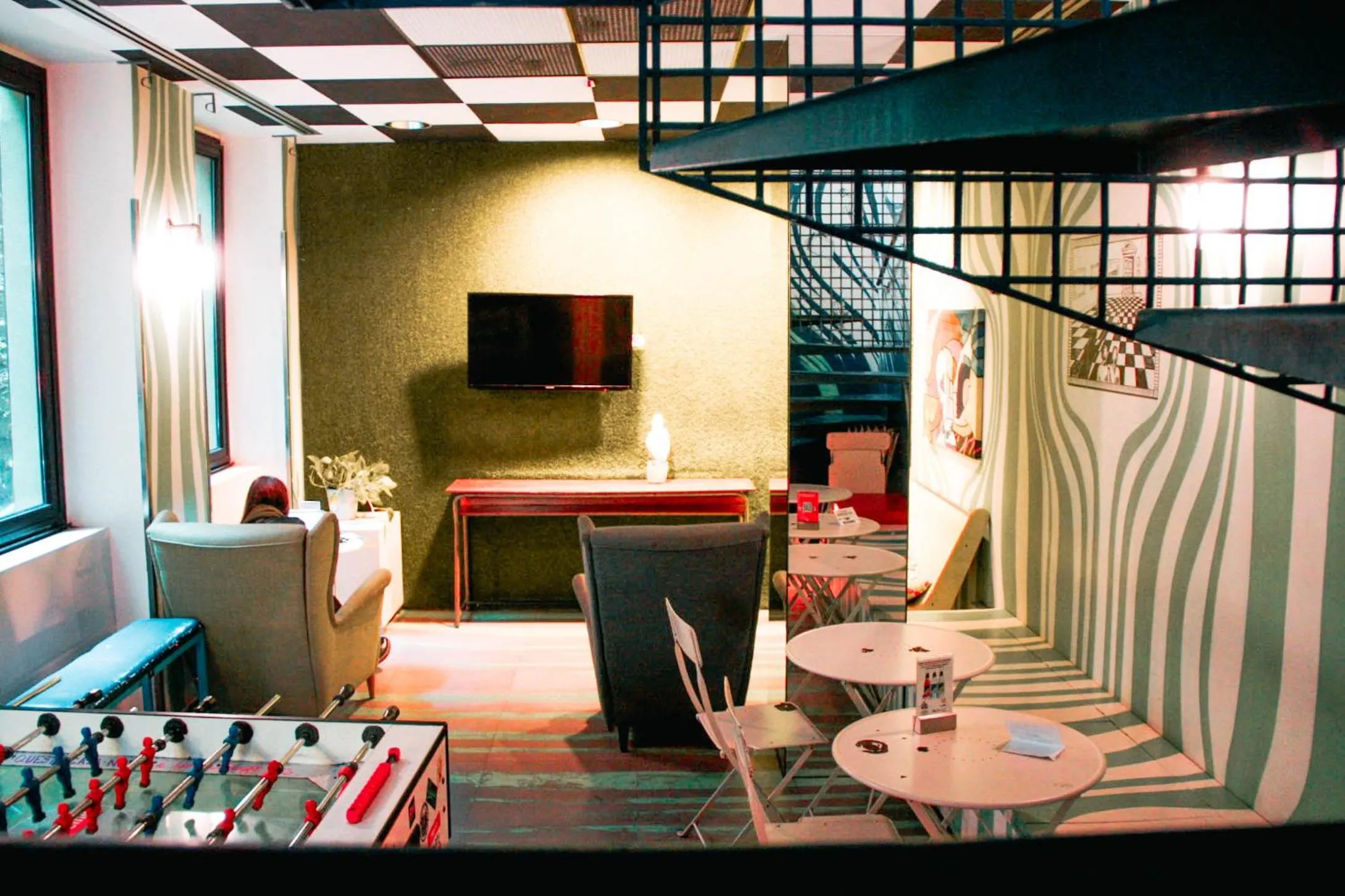 Communal lounge/ TV room in Ostello Bello Milano Centrale