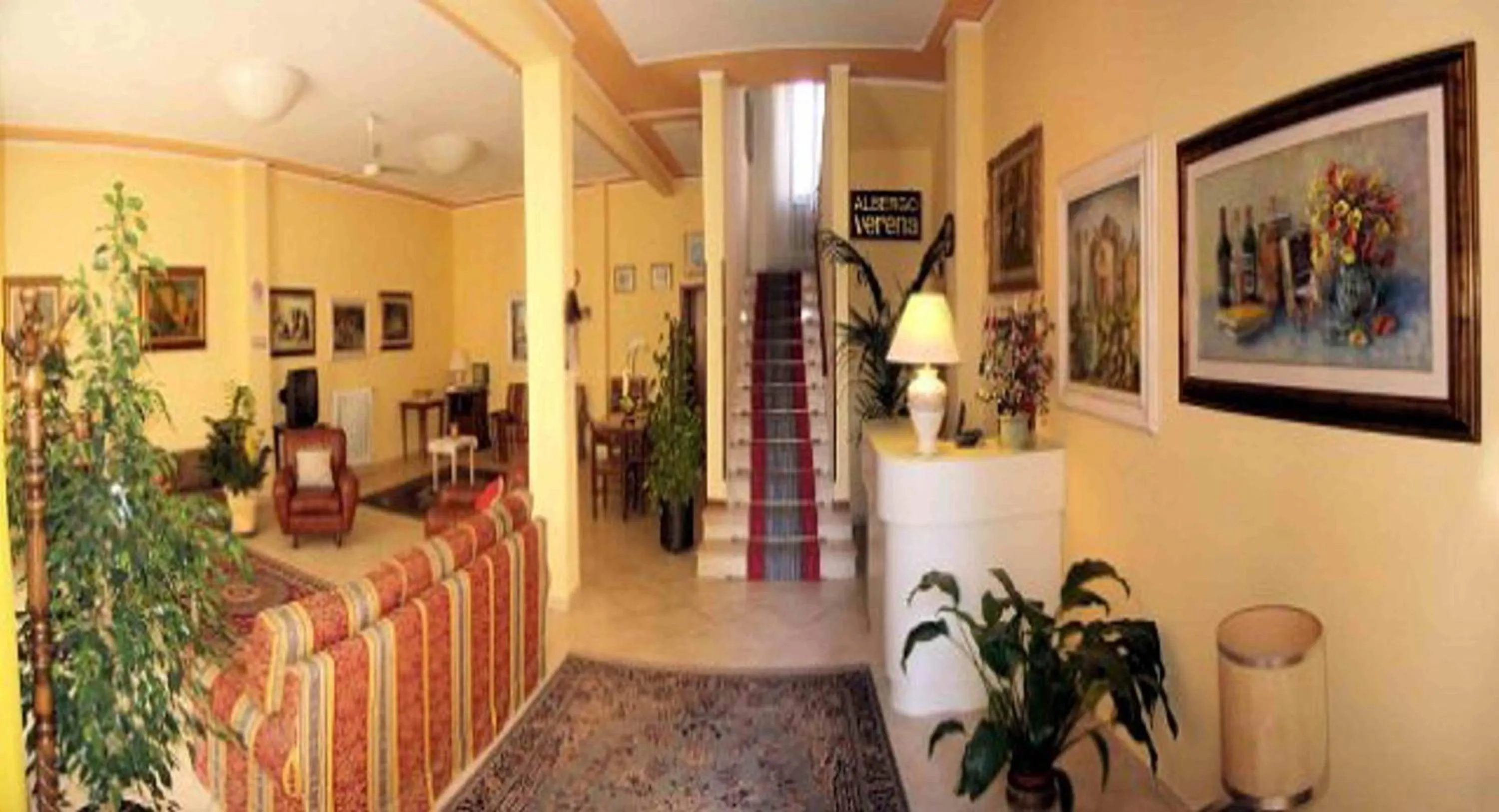 Communal lounge/ TV room in Verena Dependance Savoia & Campana