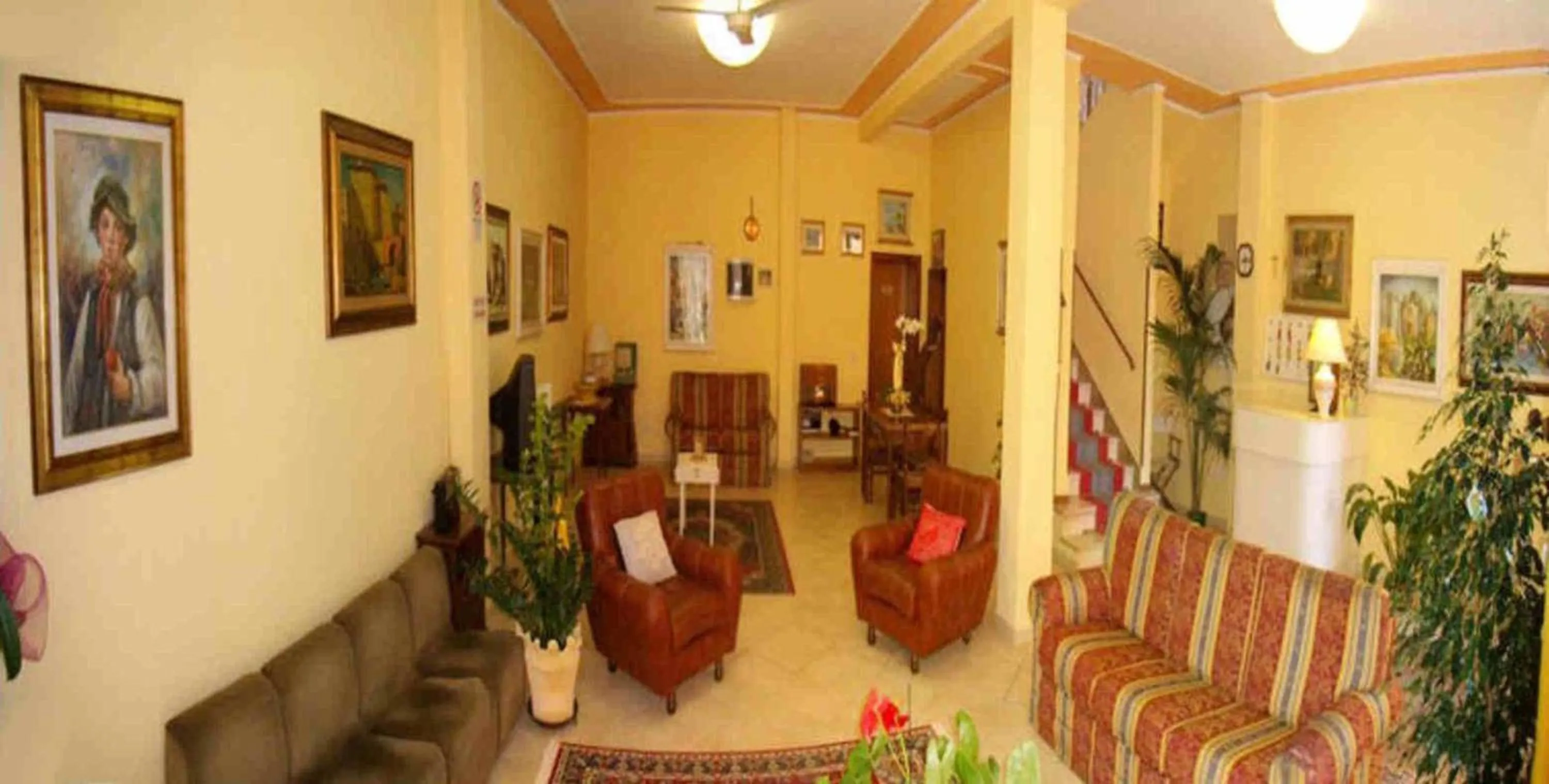 Communal lounge/ TV room in Verena Dependance Savoia & Campana