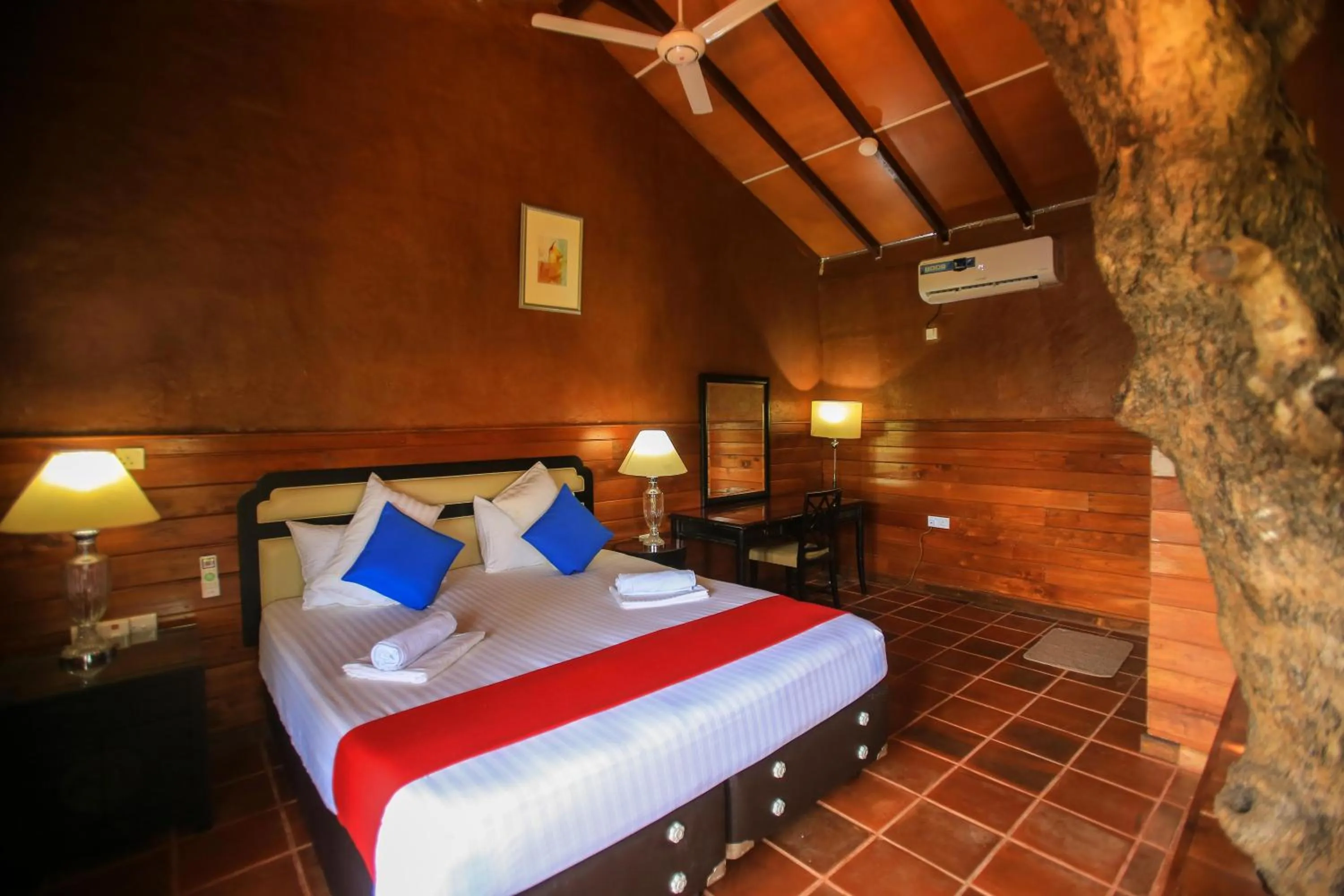 Bed in Jungle Hut Resort Sigiriya