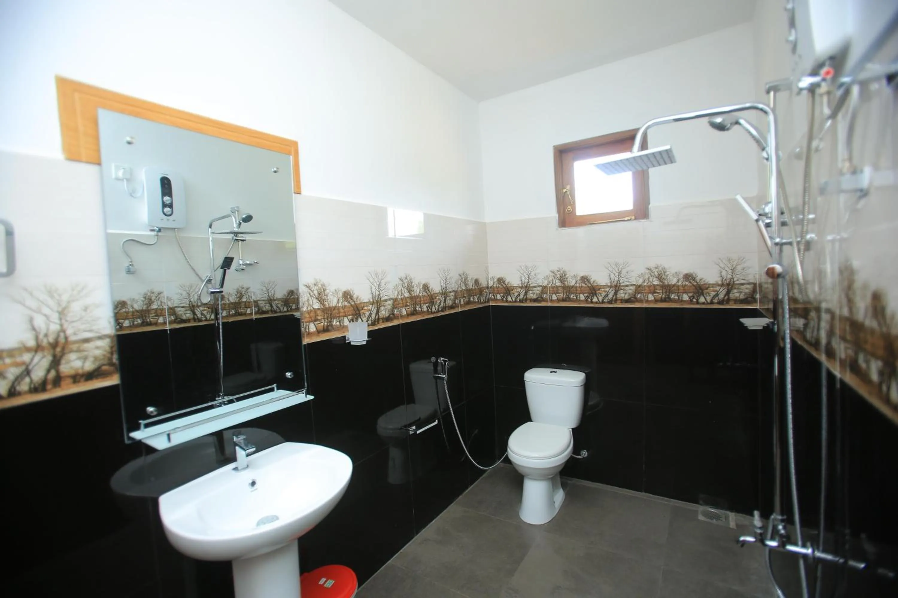 Bathroom in Jungle Hut Resort Sigiriya