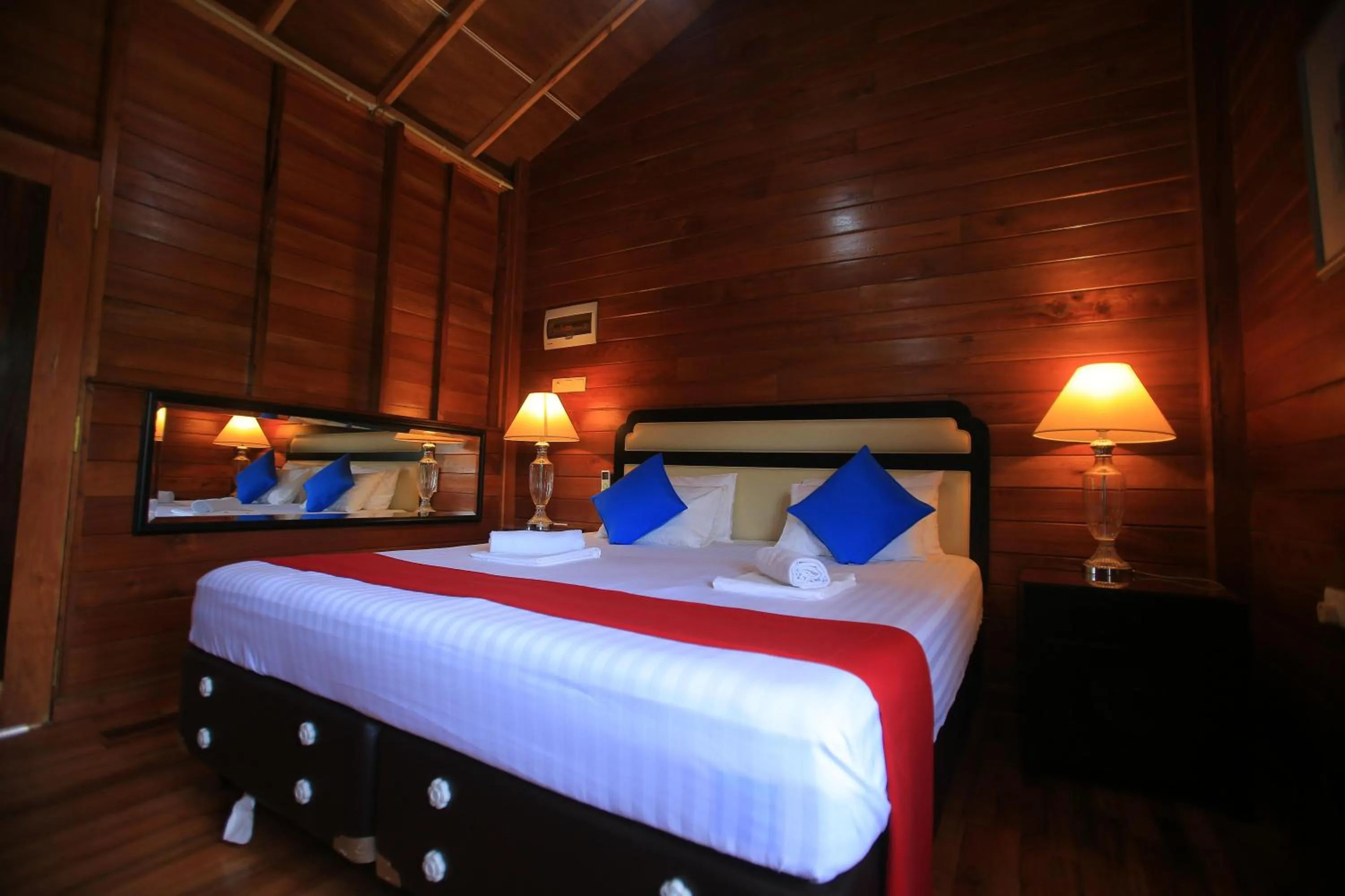 Bed in Jungle Hut Resort Sigiriya