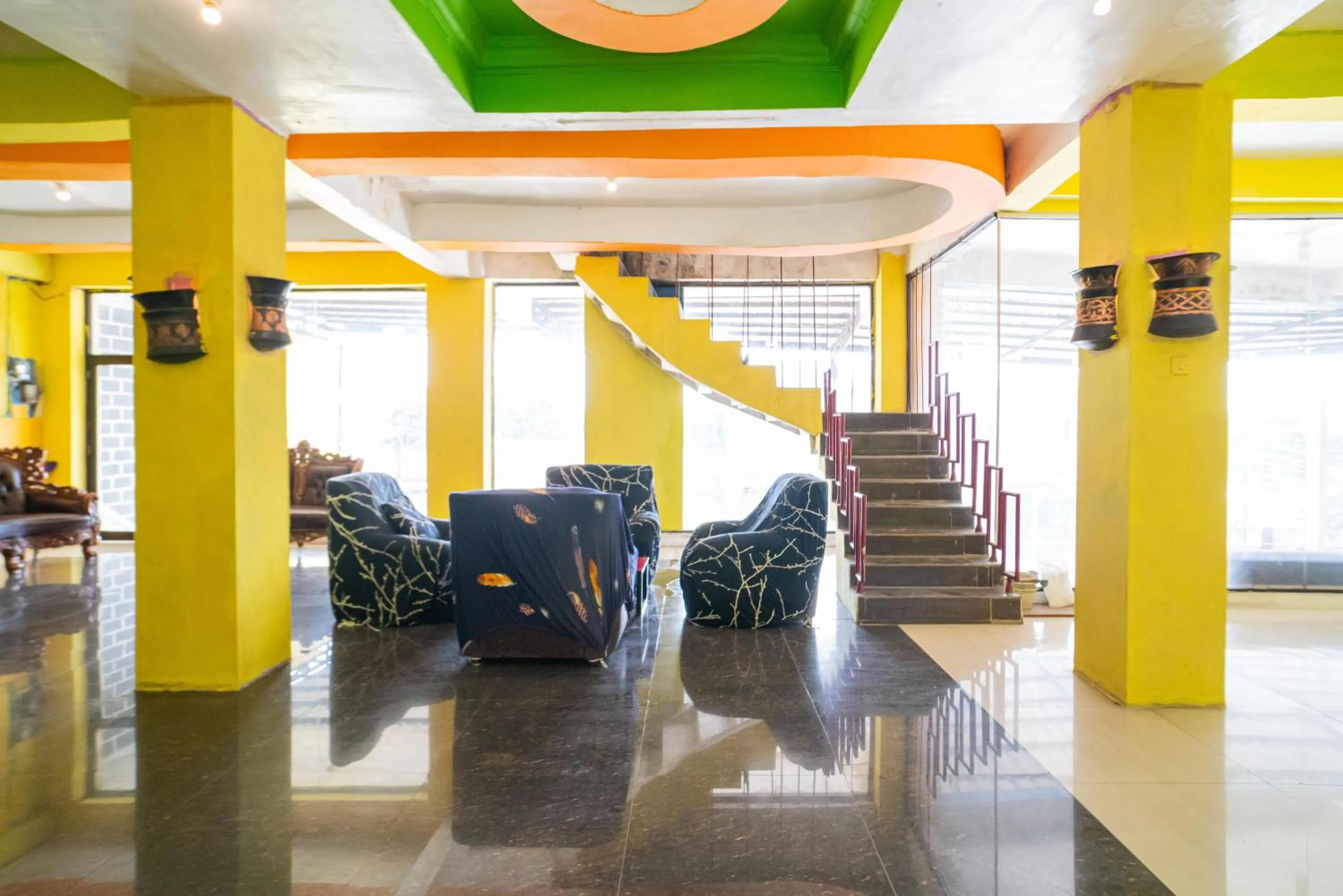 Seating area in RedDoorz @ Kampung Sawah Jatimurni Bekasi