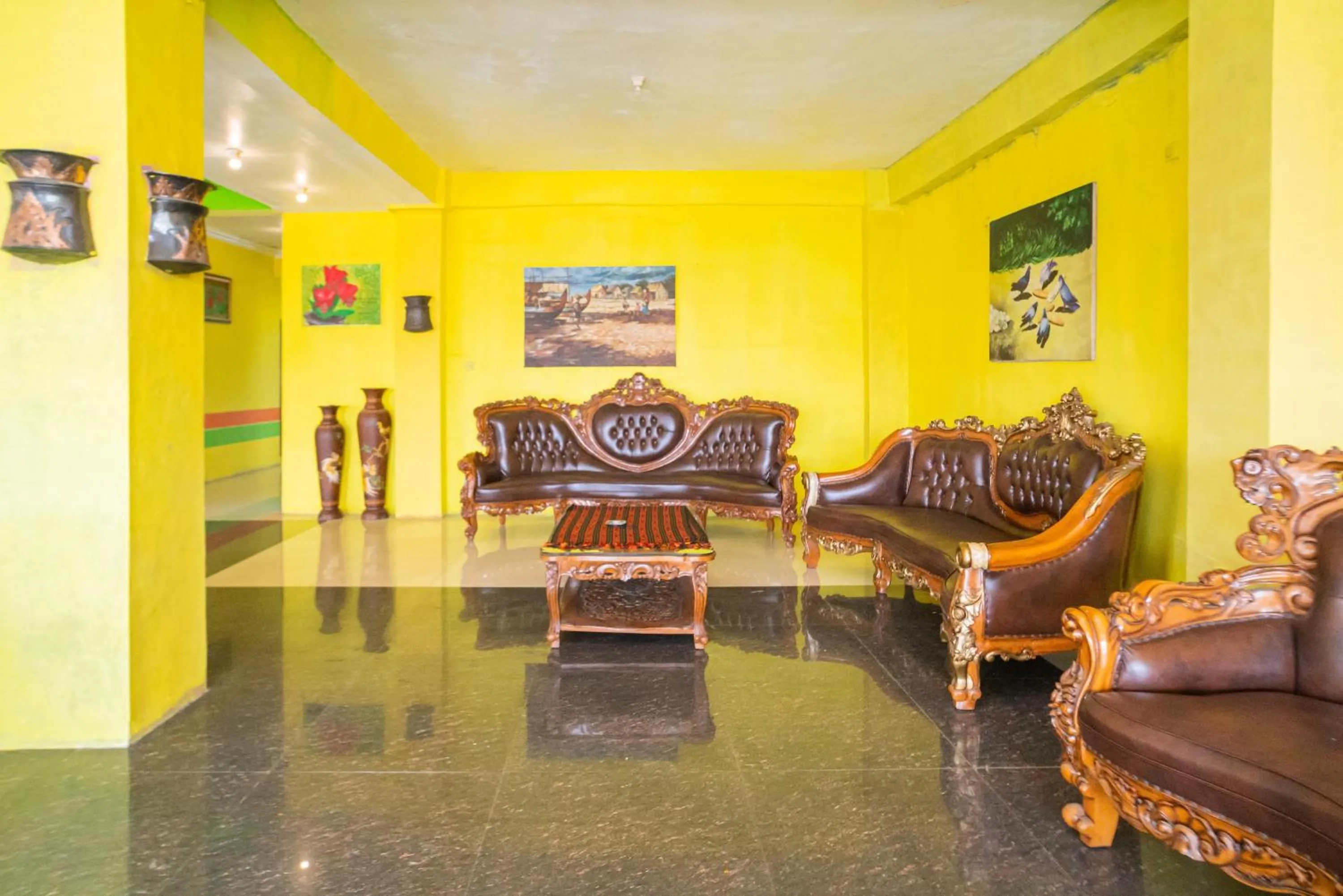 Seating area in RedDoorz @ Kampung Sawah Jatimurni Bekasi