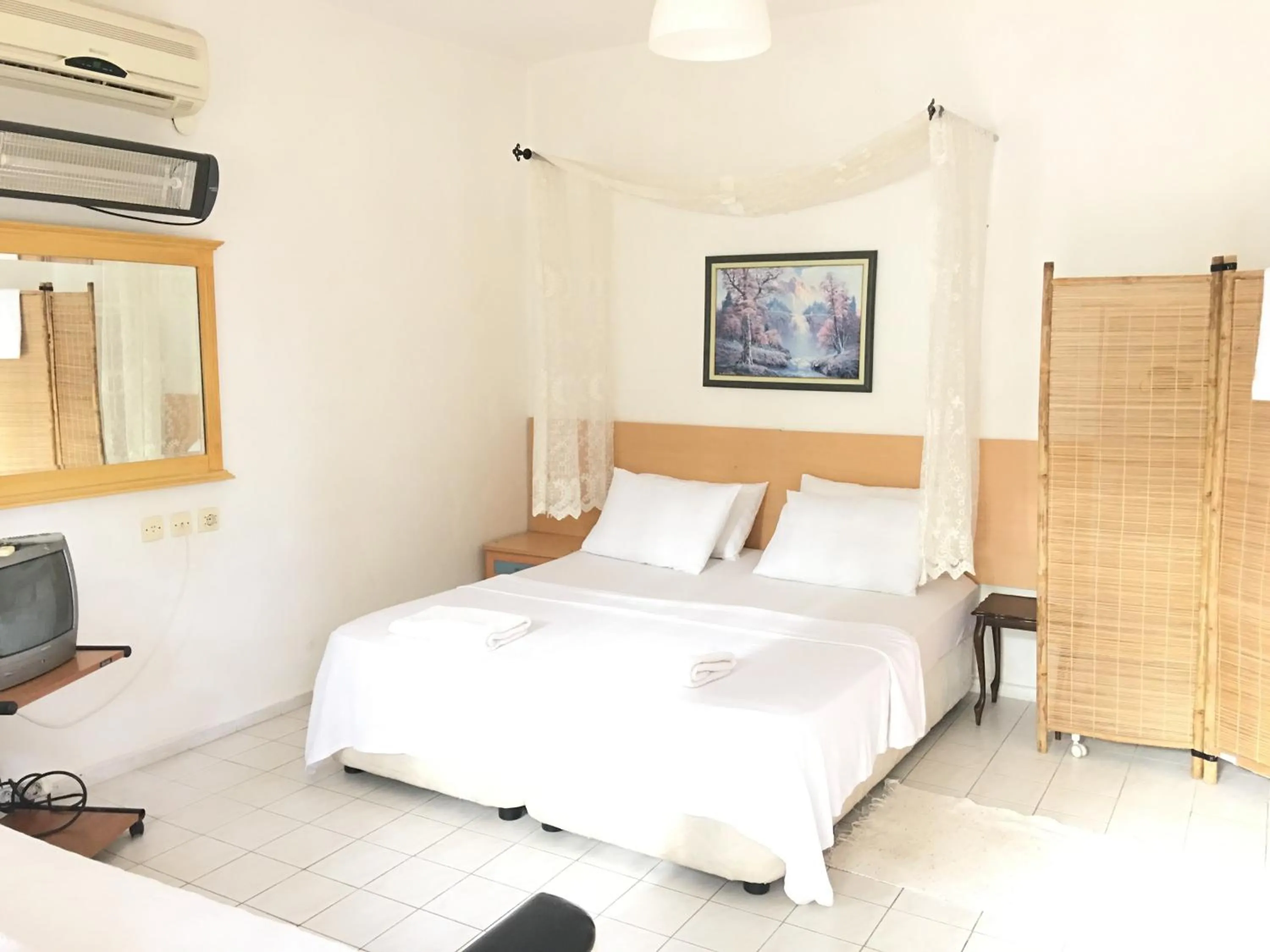 Bed in Mursel Garden Hotel