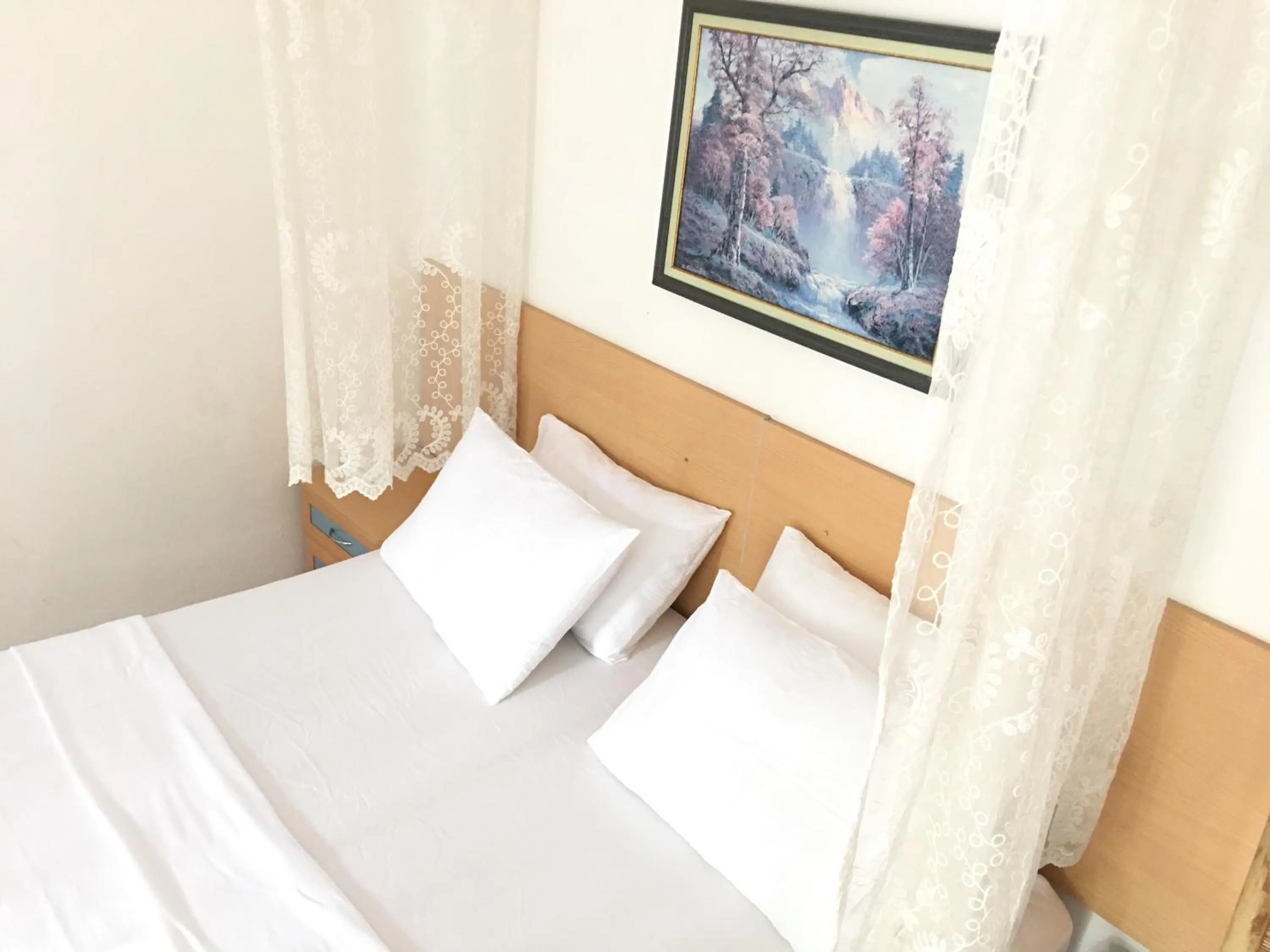 Bed in Mursel Garden Hotel