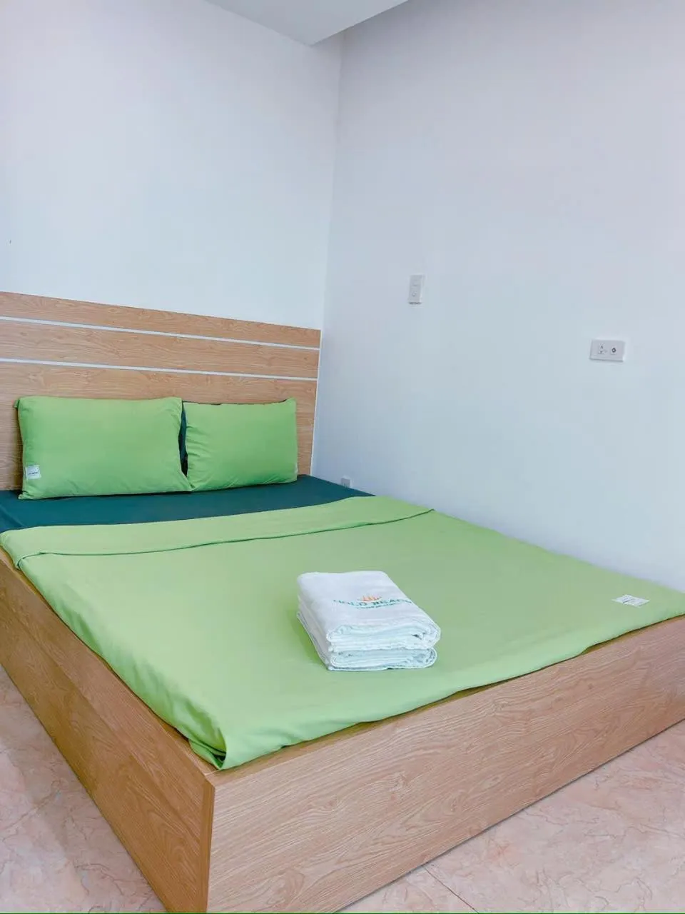 Bed in Pearl Nha Trang Beach Apartment