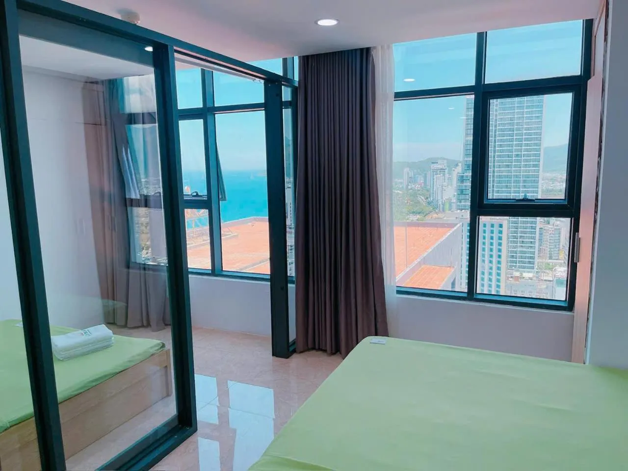 Bed in Pearl Nha Trang Beach Apartment
