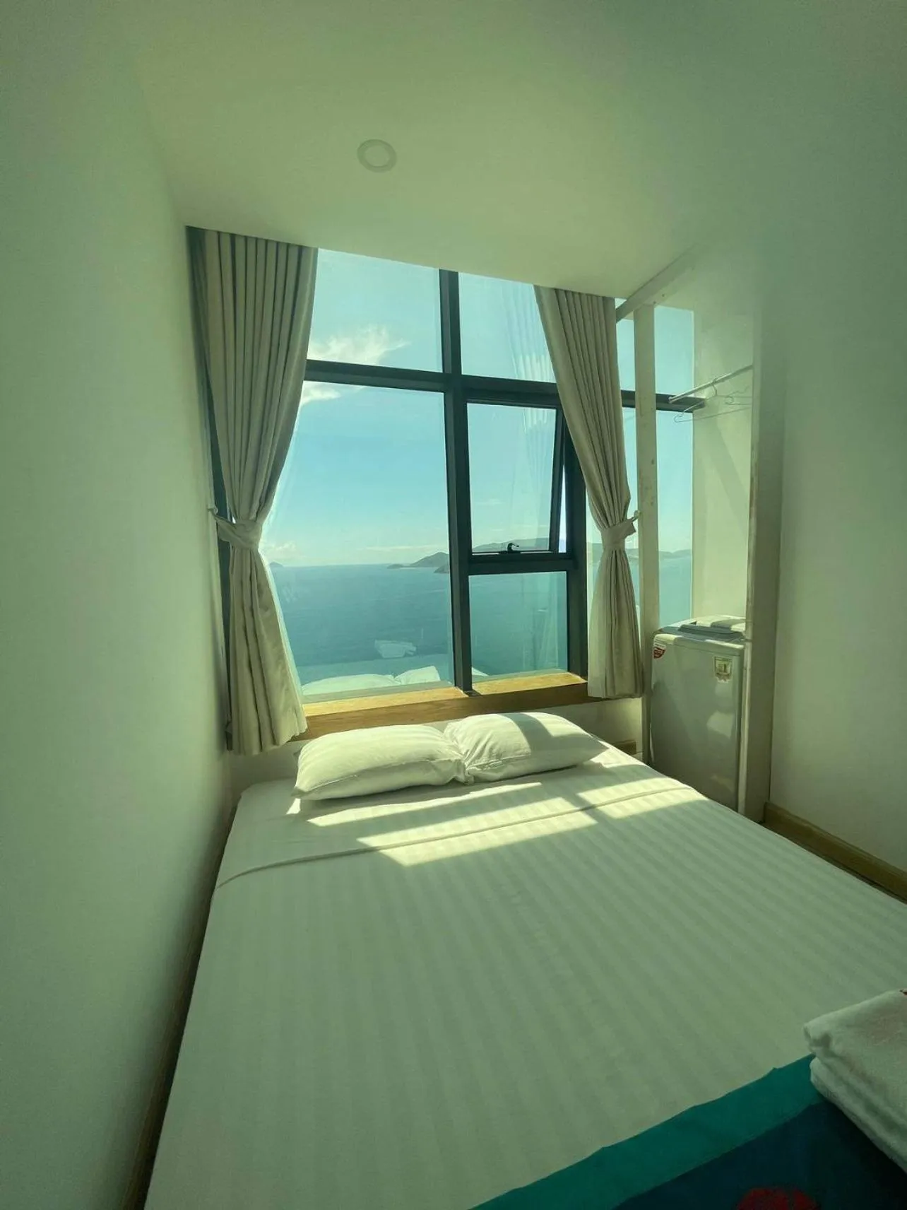 Bed in Pearl Nha Trang Beach Apartment