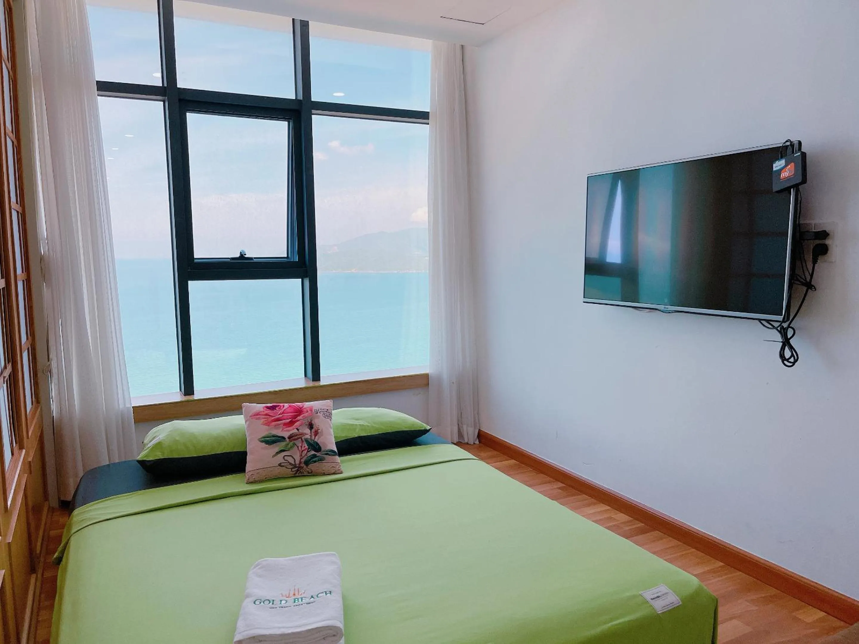 Bed in Pearl Nha Trang Beach Apartment