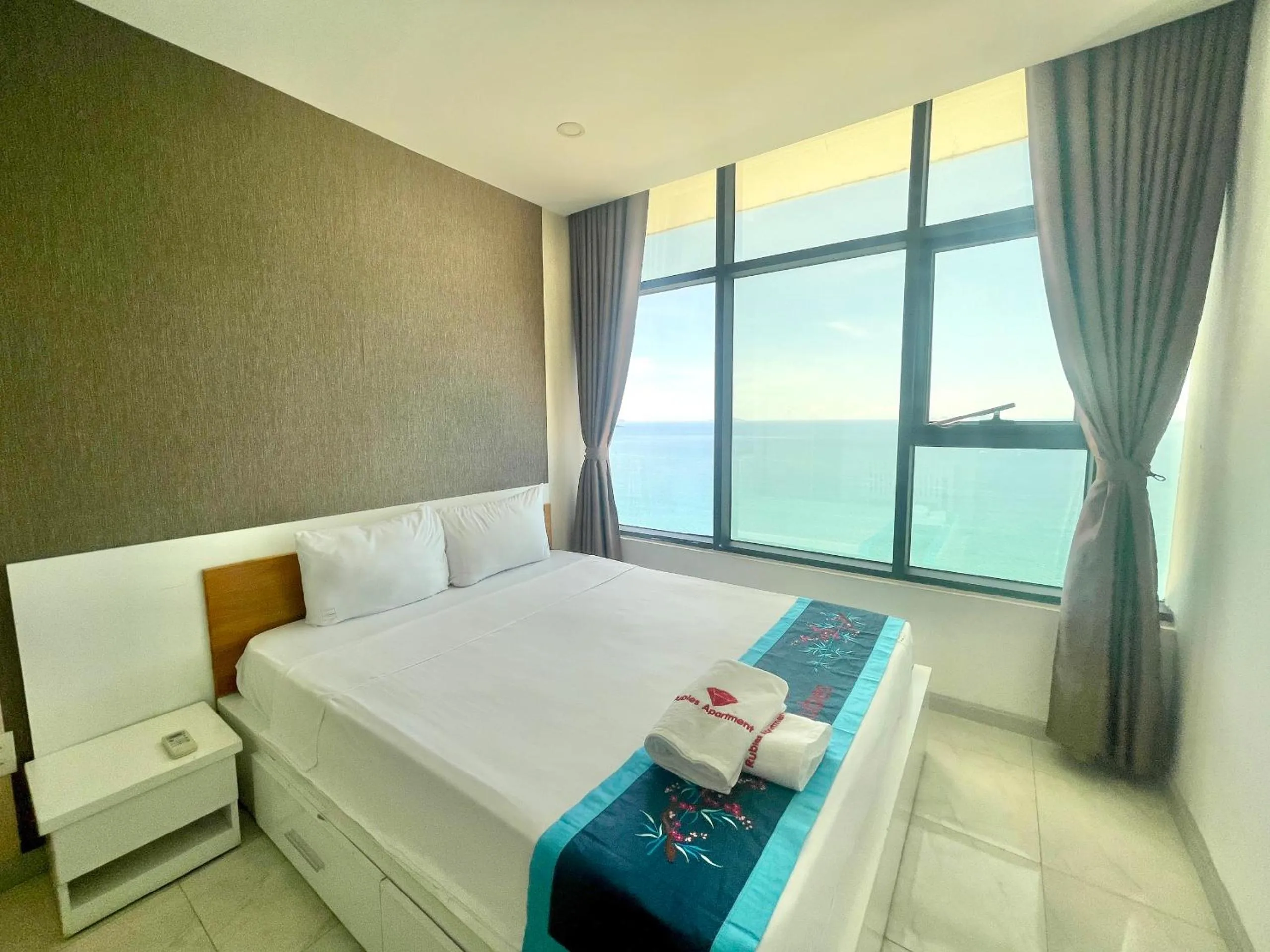 Bed in Pearl Nha Trang Beach Apartment