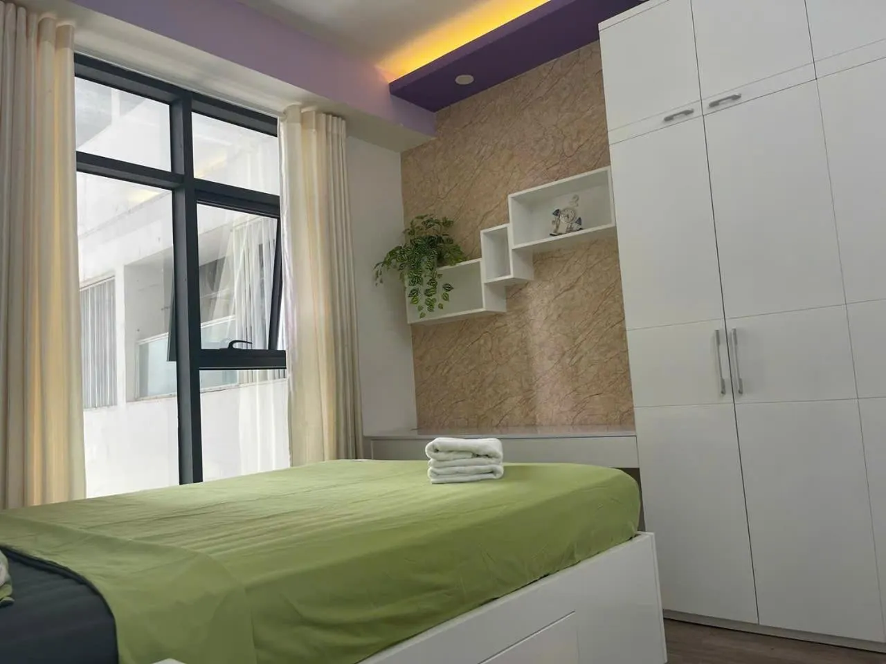 Bed in Pearl Nha Trang Beach Apartment