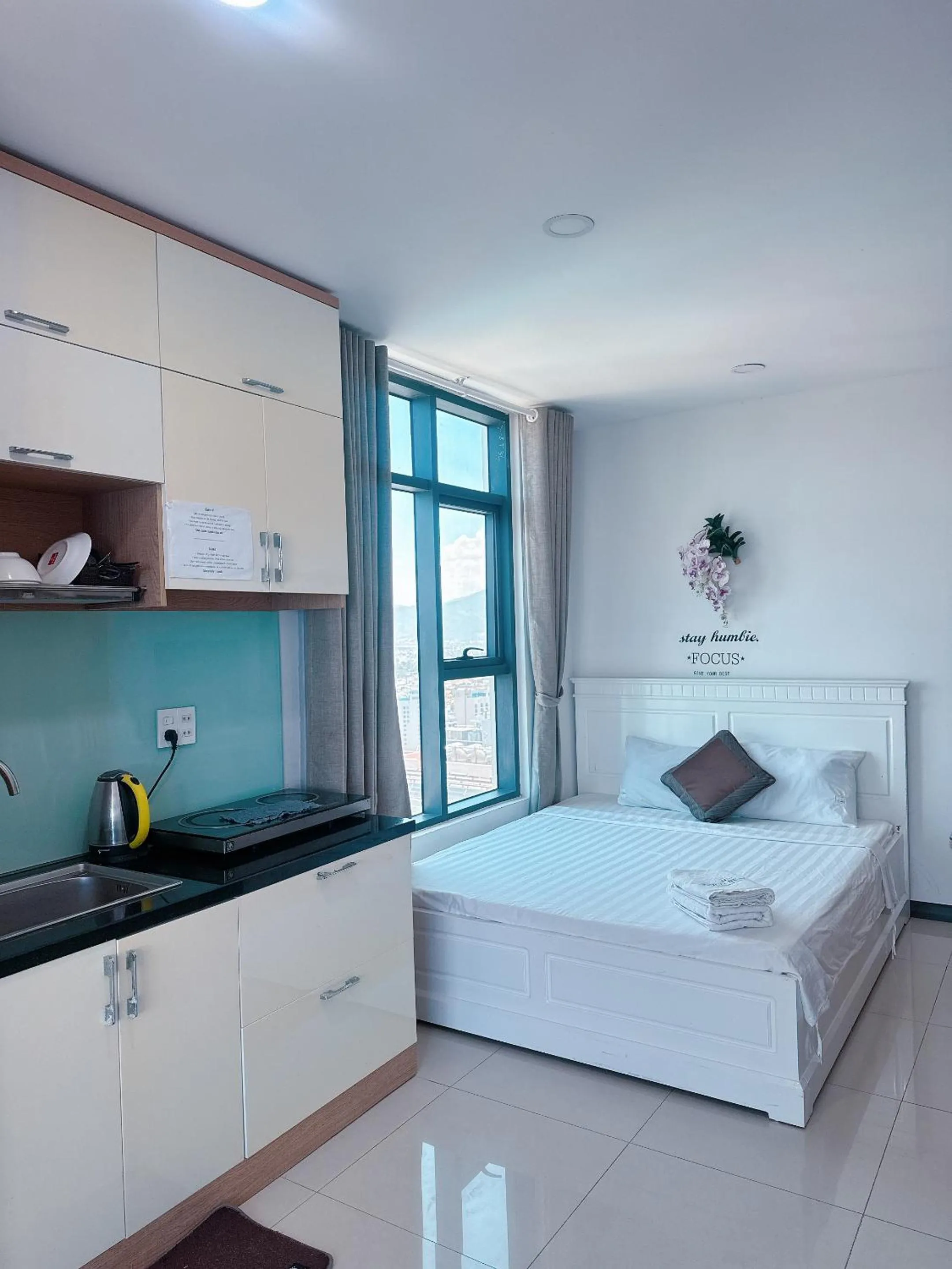 Bed in Pearl Nha Trang Beach Apartment