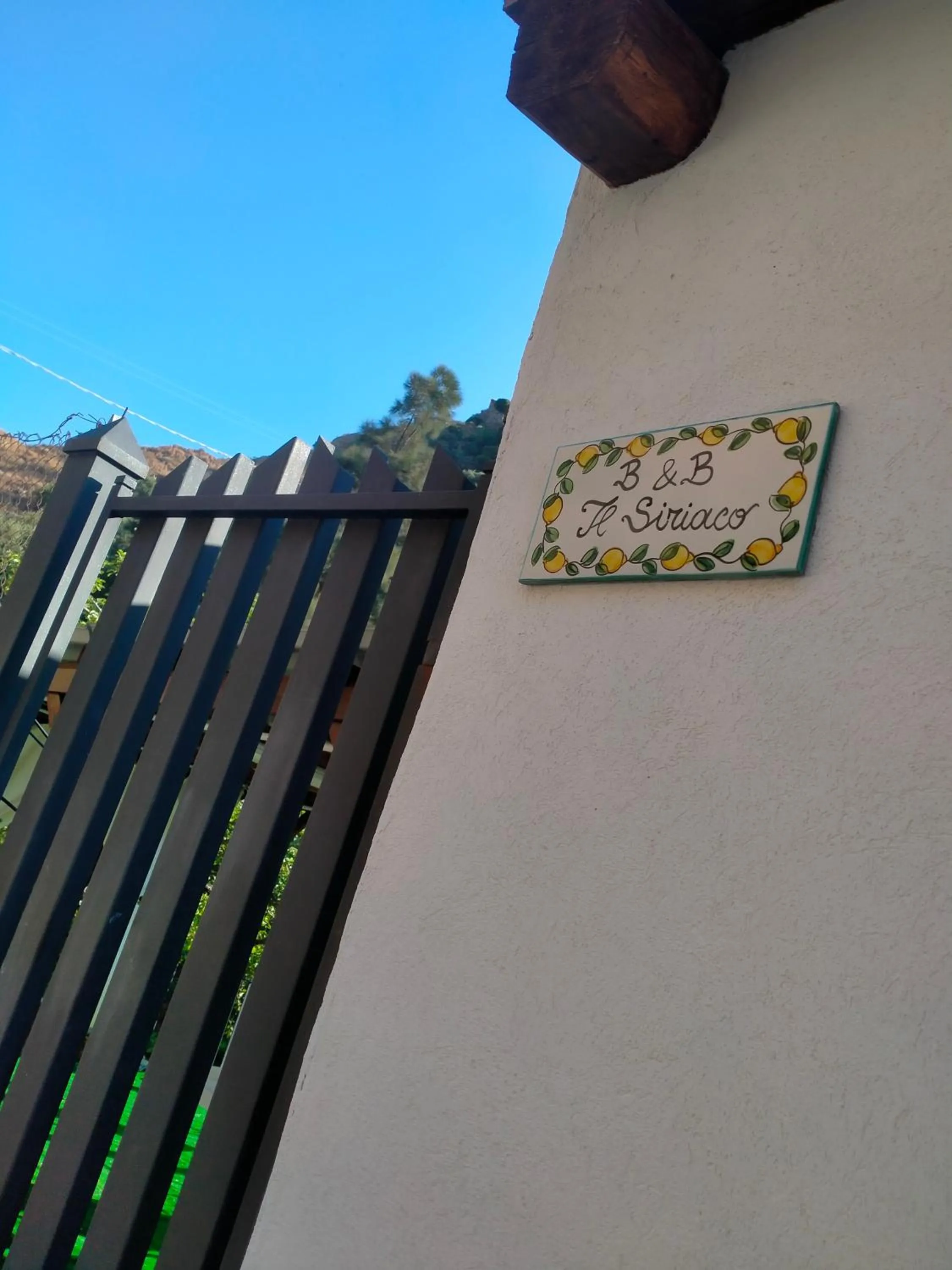 Property logo or sign in Il Siriaco