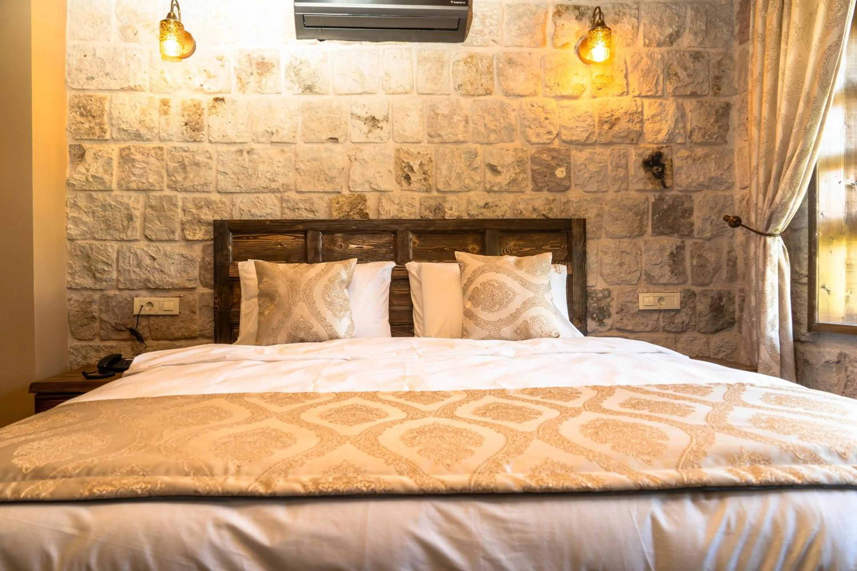 Bed in Flavia Cappadocia Hotel