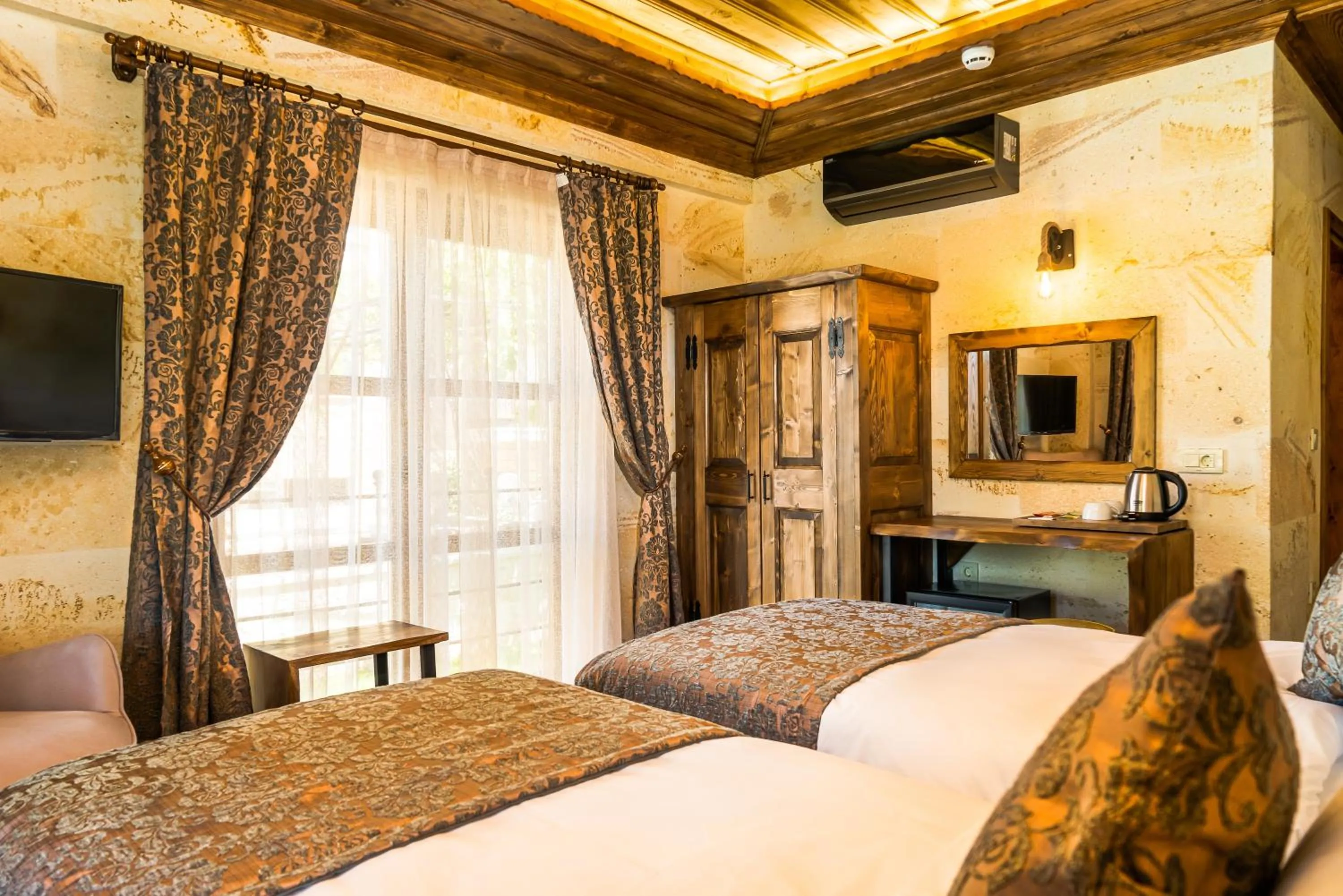 Bed in Flavia Cappadocia Hotel