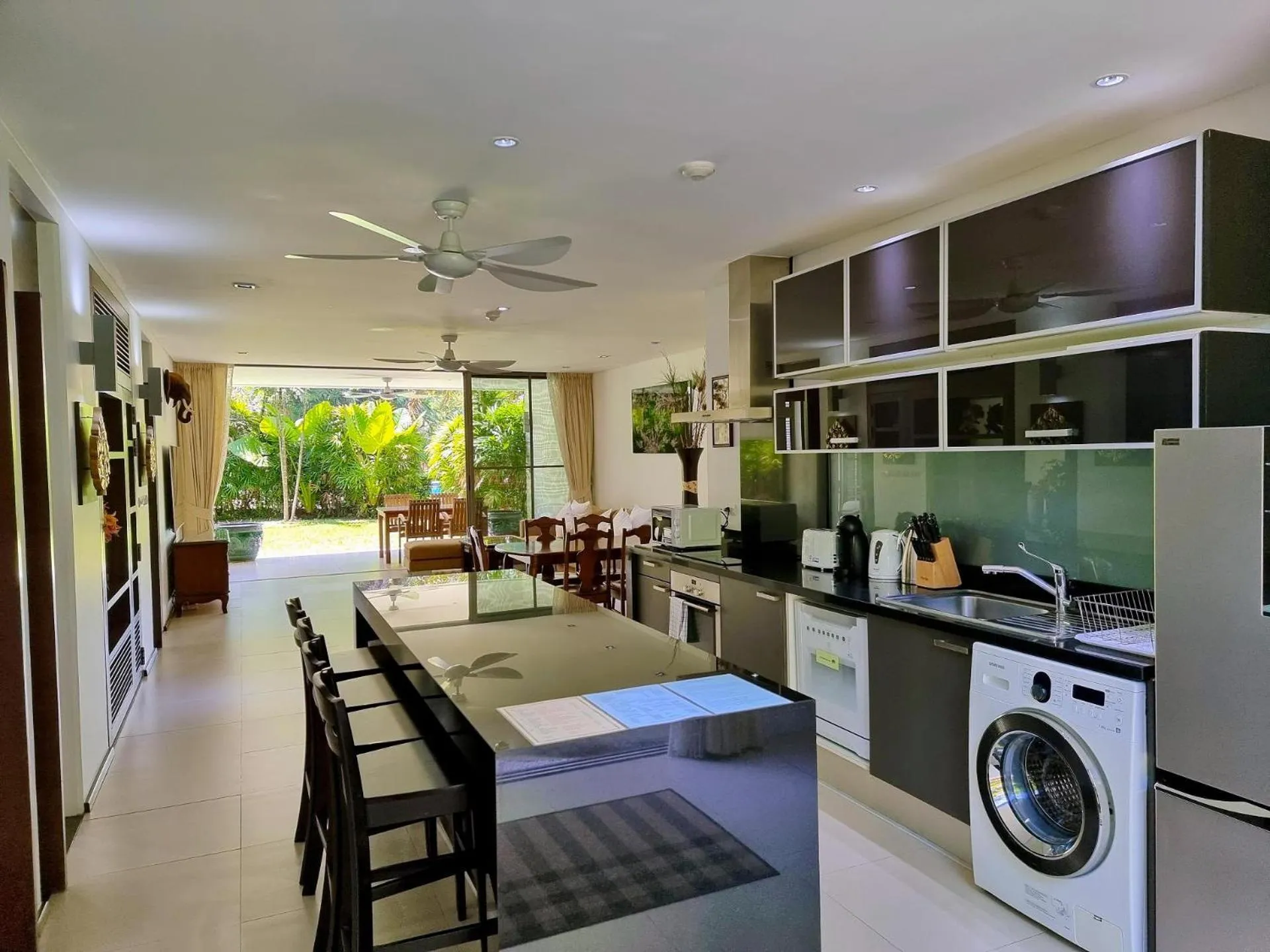 Kitchen or kitchenette in Casuarina Shores Apartment - SHA Plus