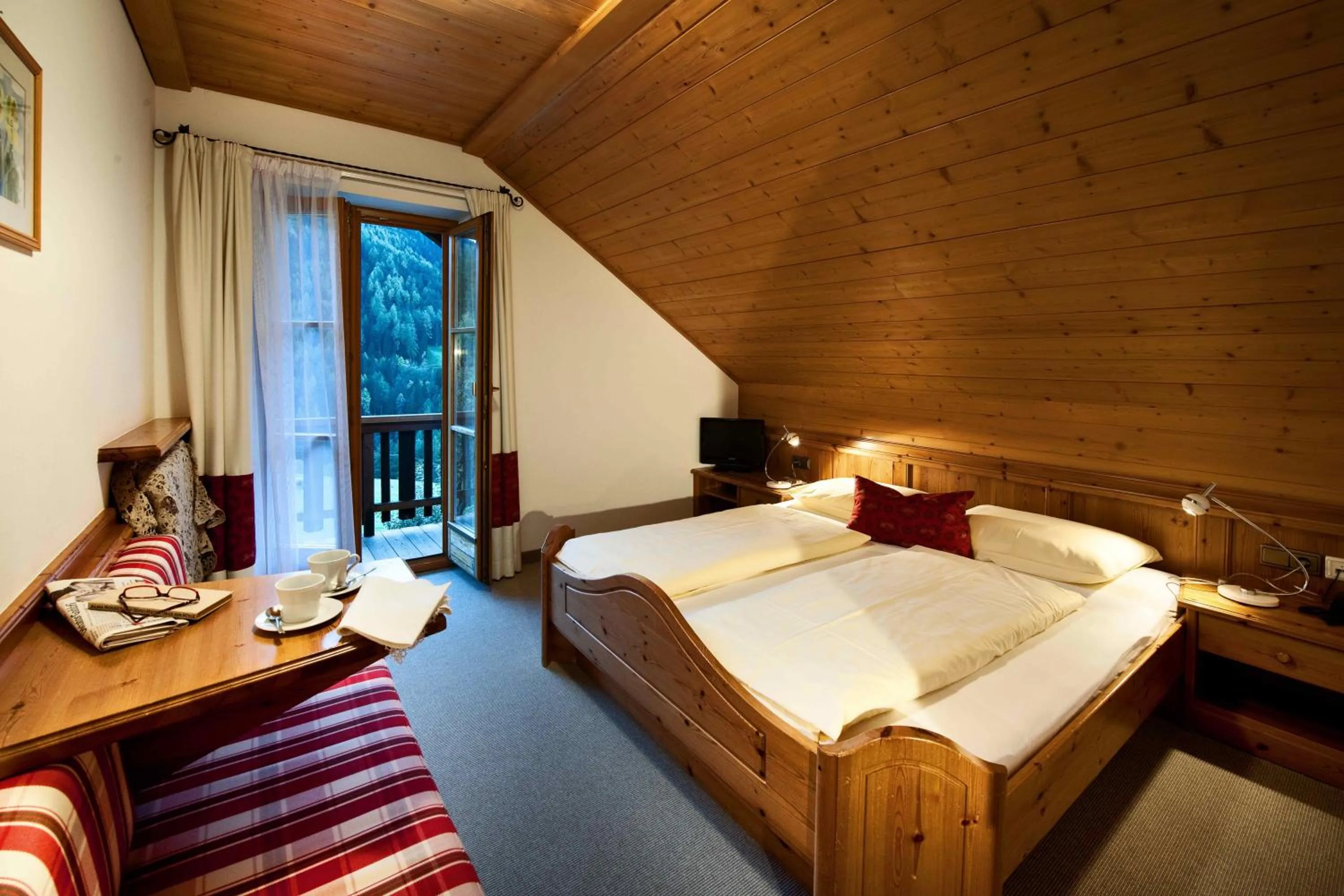 Photo of the whole room, Bed in Naturhotel Saalerwirt