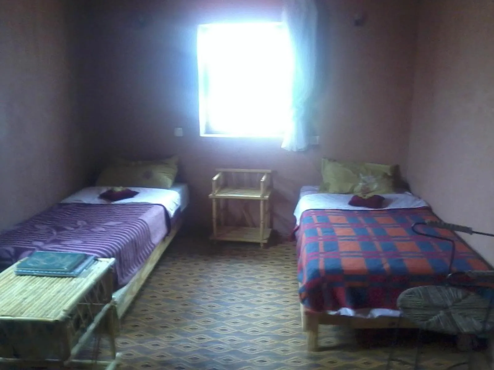 Photo of the whole room, Bed in auberge restau tombouctou