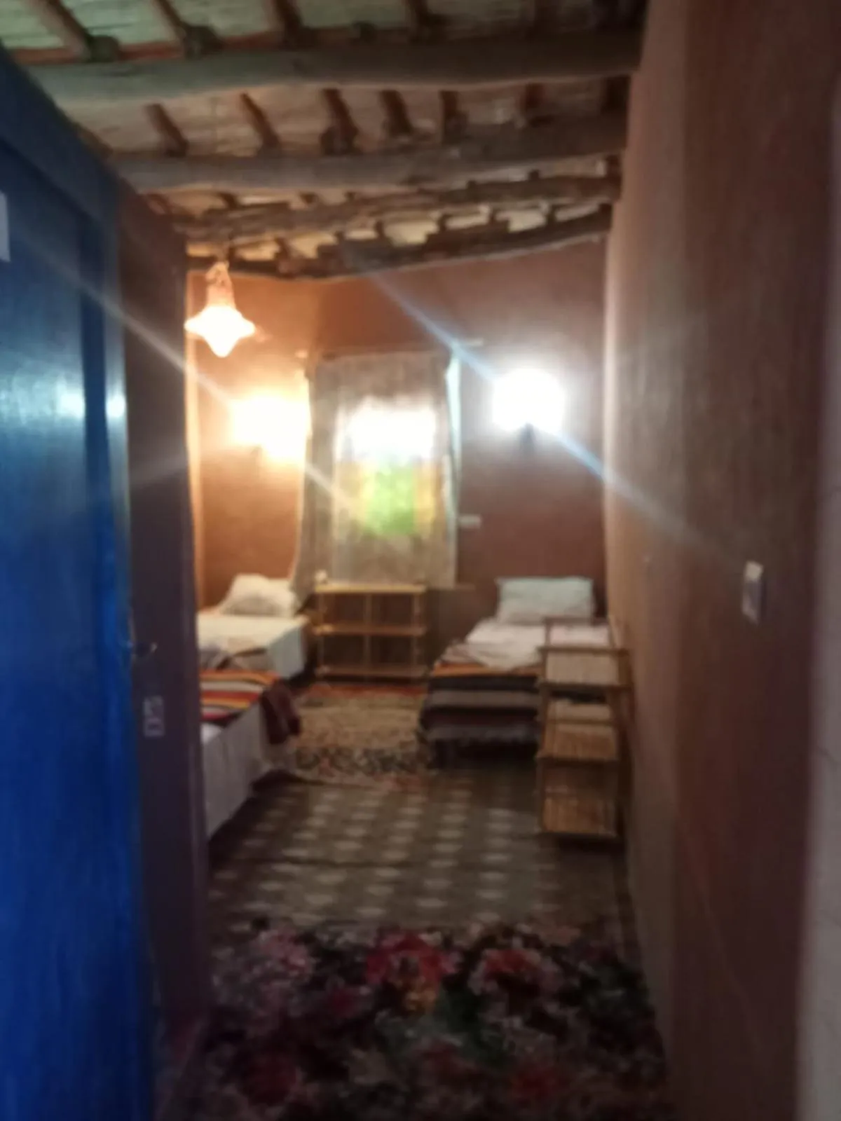 Photo of the whole room, Bed in auberge restau tombouctou