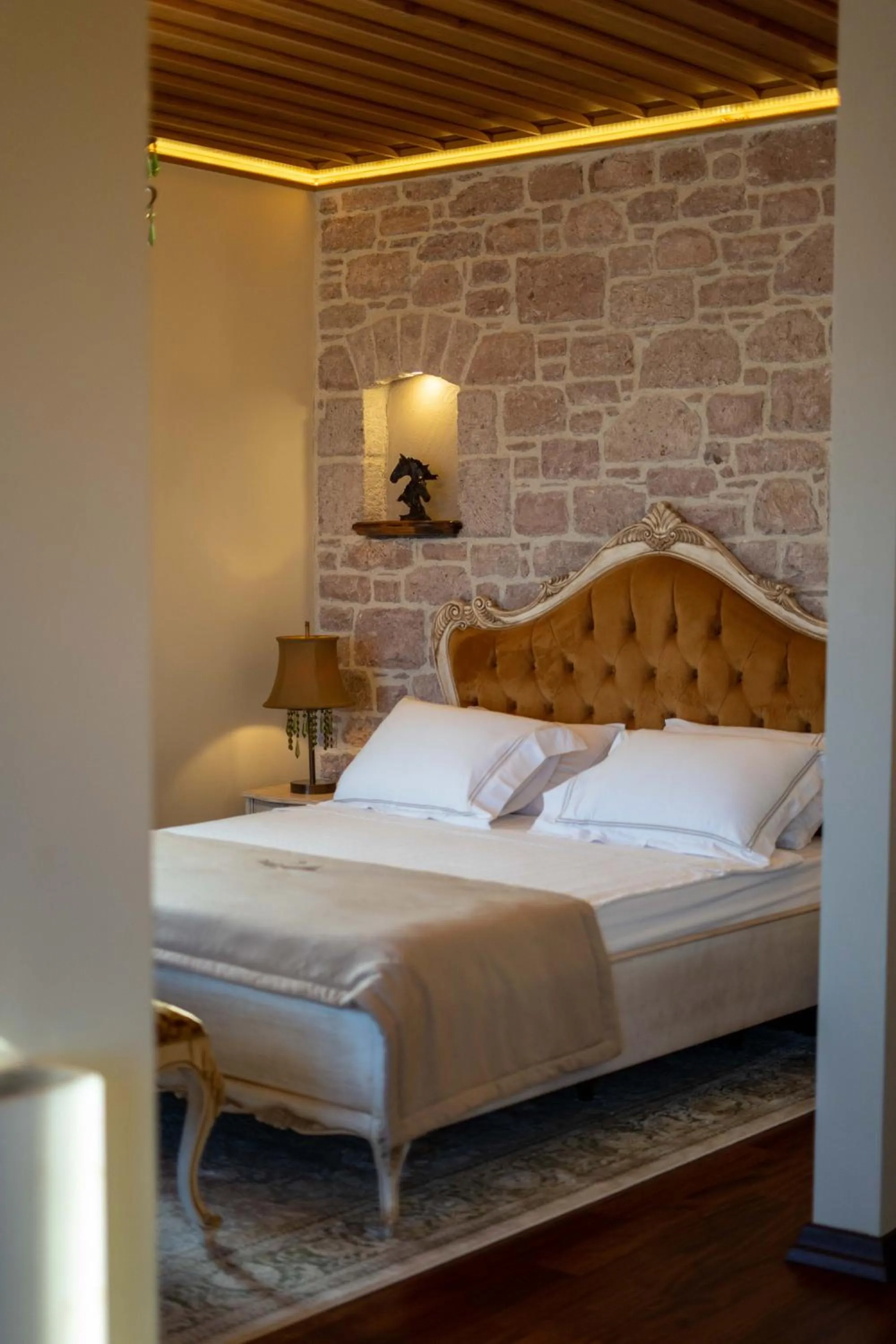 Bed in CUNDA BARADİEL Hotel