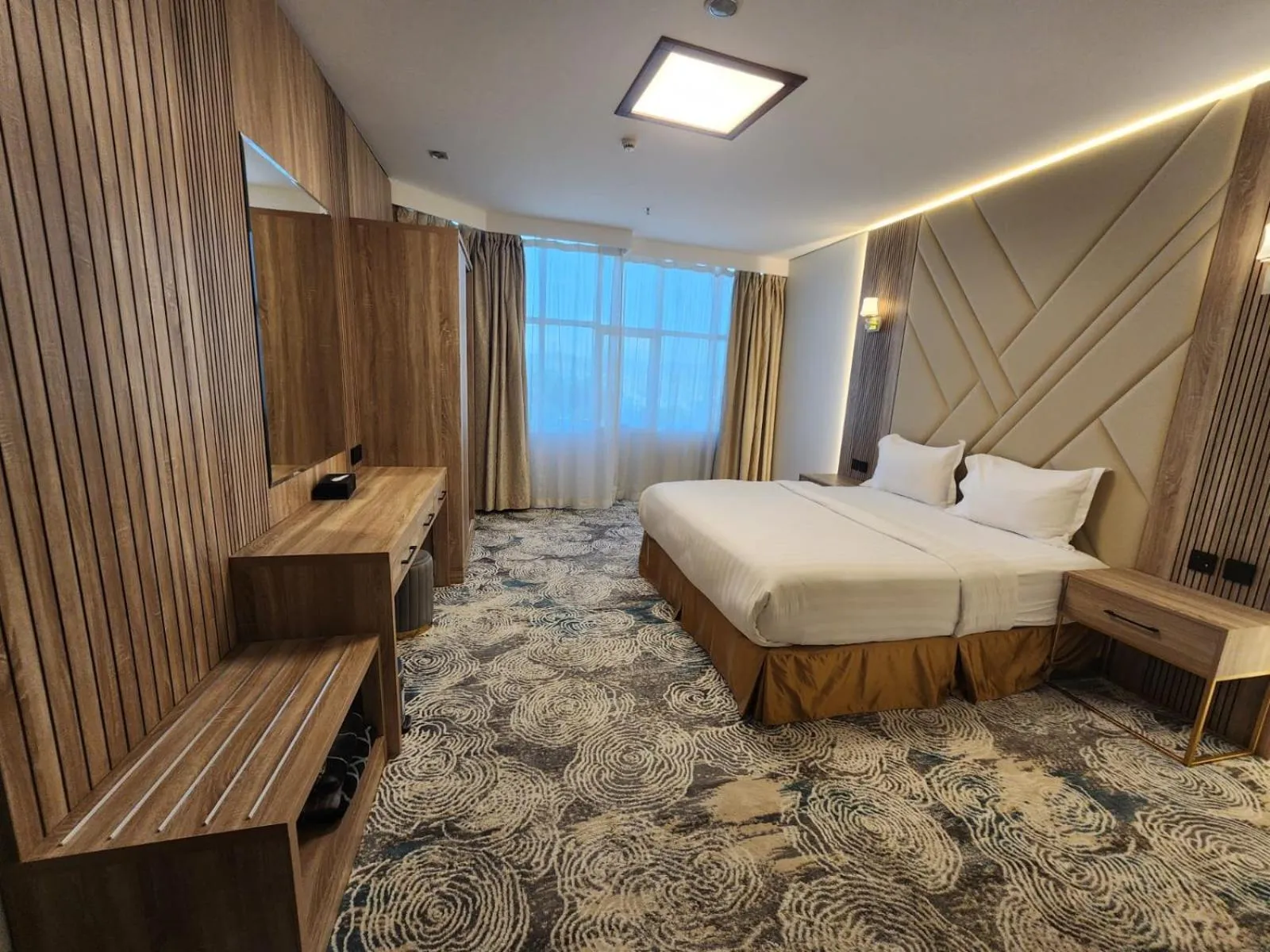 Bed in Sadeem Al Fajr Hotel Suites