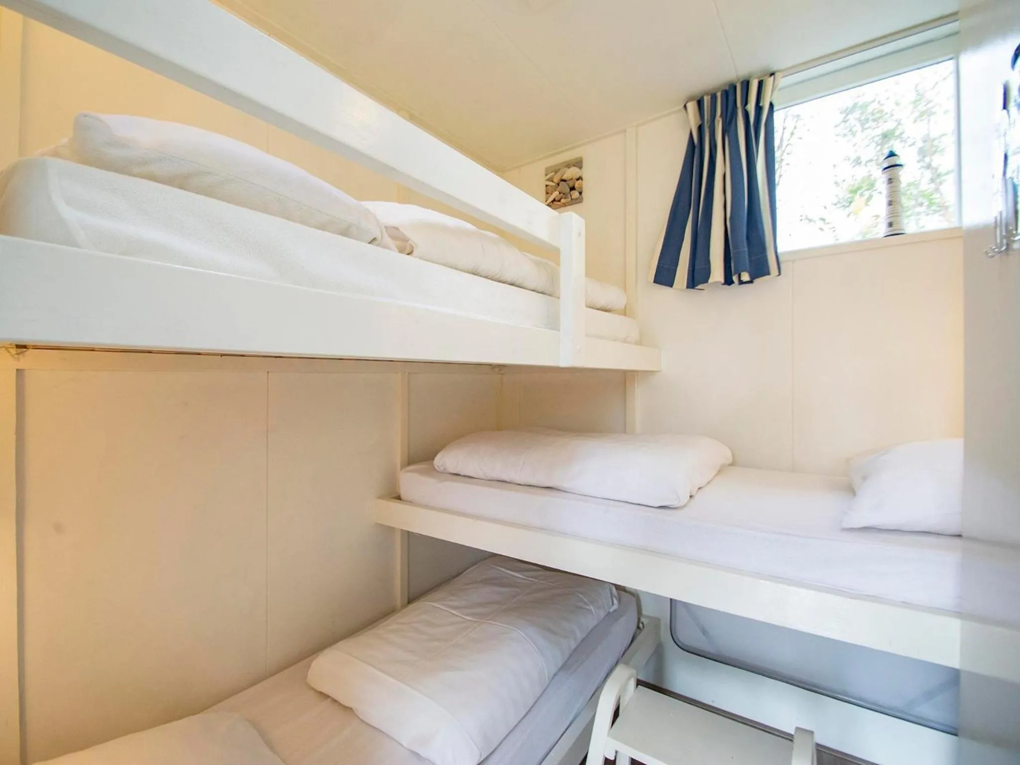 Bedroom, Bed in Bungalow near Dutch Beach & Family-Friendly Park