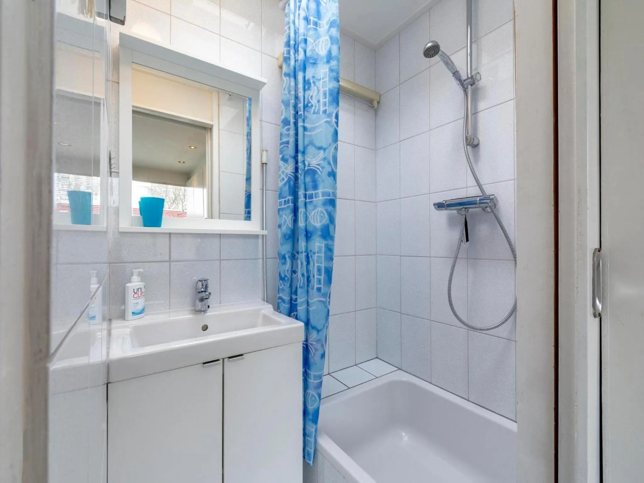 Bathroom in Bungalow near Dutch Beach & Family-Friendly Park