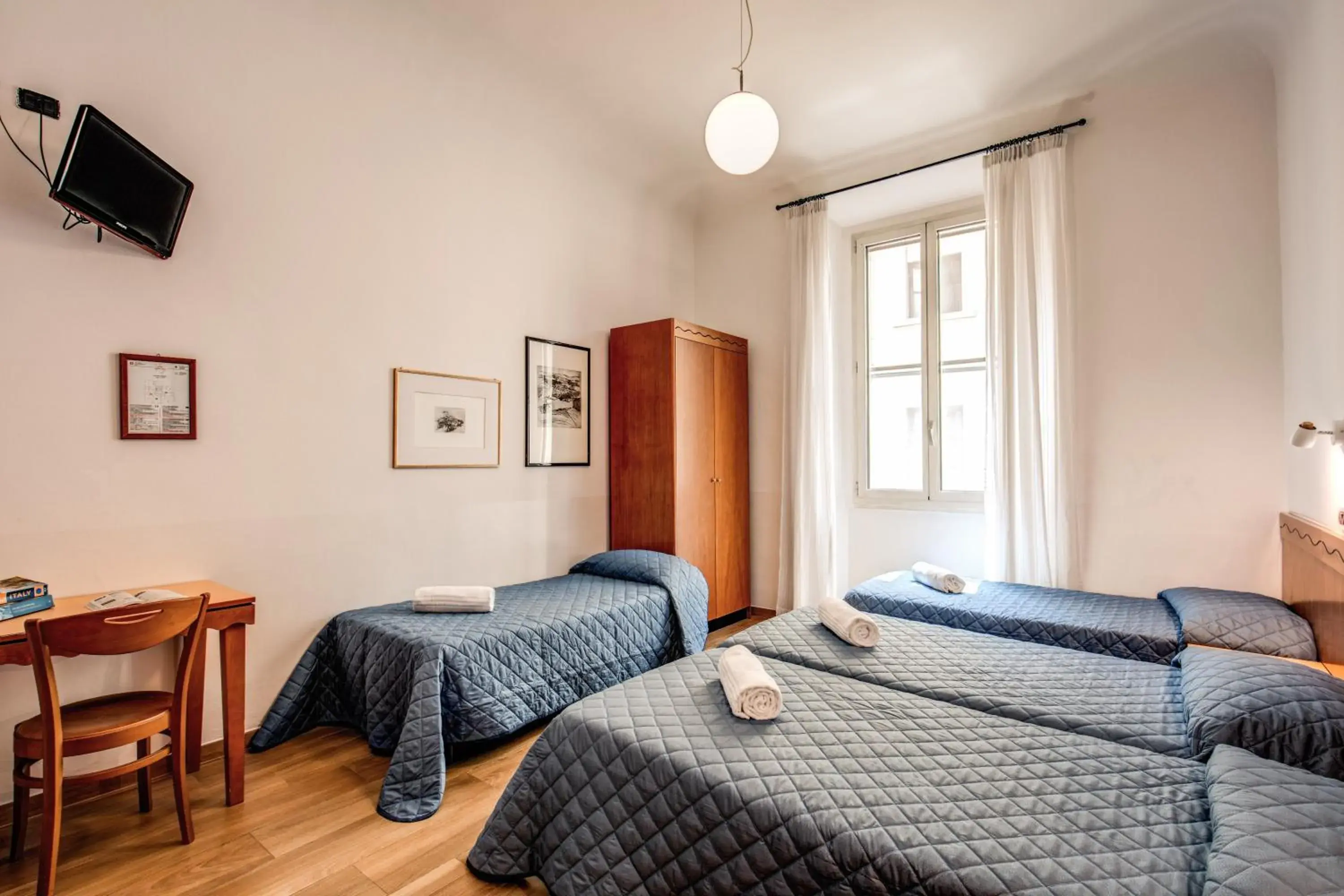 Photo of the whole room, Bed in Hotel Nuova Italia Photo of the whole room, Bed in Hotel Nuova Italia