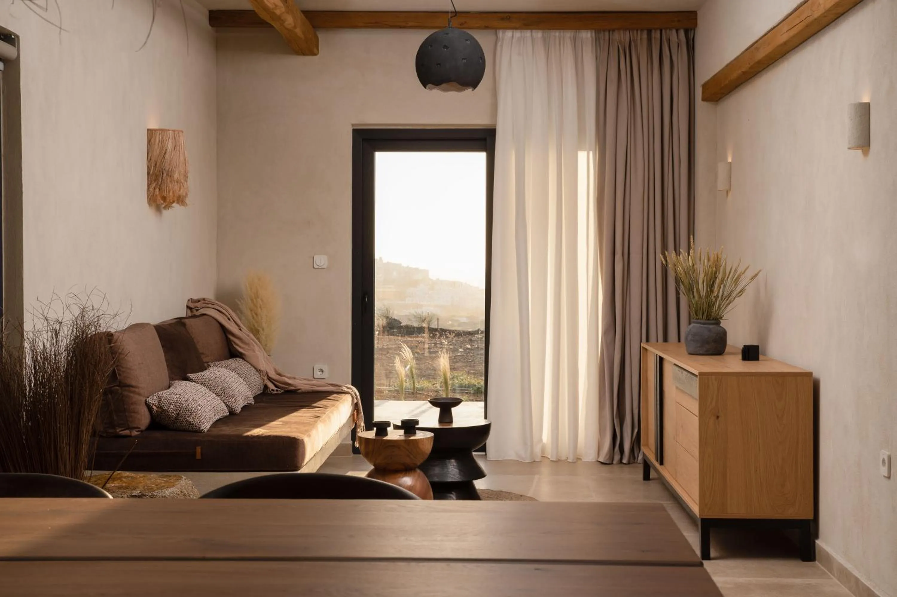 Living room, Bed in Opuntia Suites