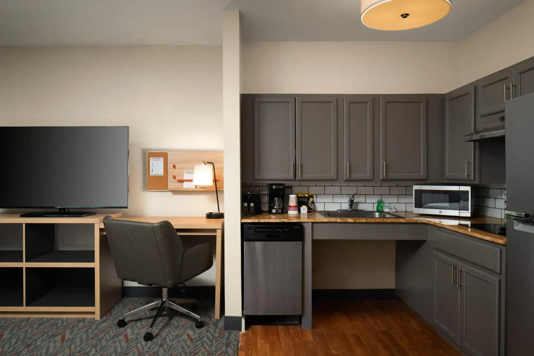 Photo of the whole room, Kitchen/Kitchenette in Candlewood Suites St Louis St Charles, an IHG Hotel