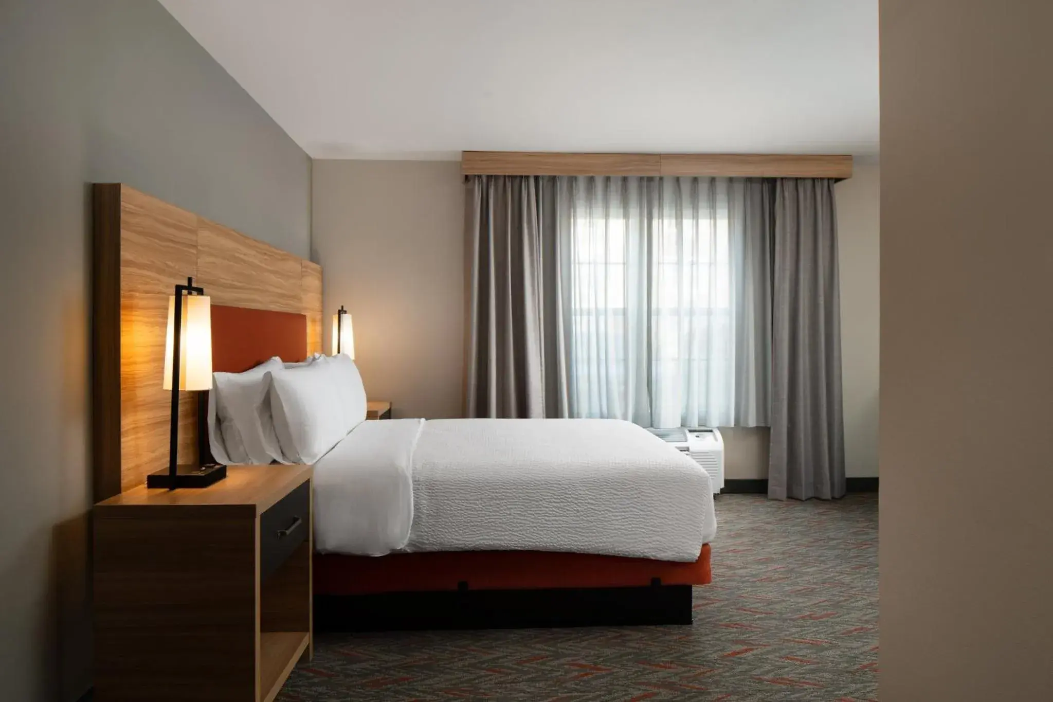 Photo of the whole room, Bed in Candlewood Suites St Louis St Charles, an IHG Hotel