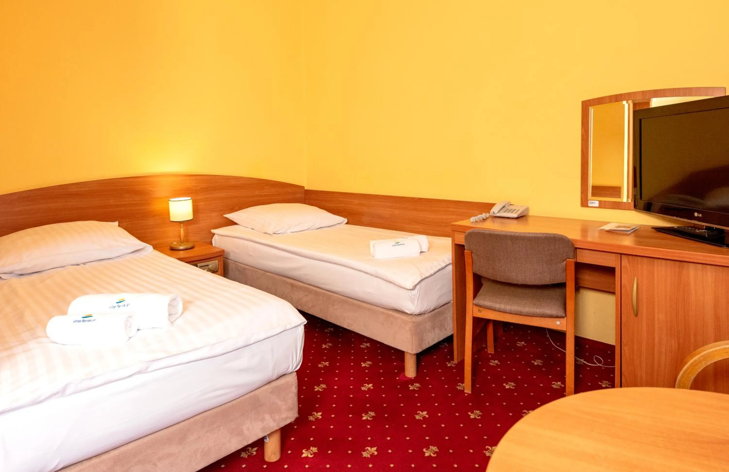 Communal lounge/ TV room, Bed in Interferie Chalkozyn w Kołobrzegu