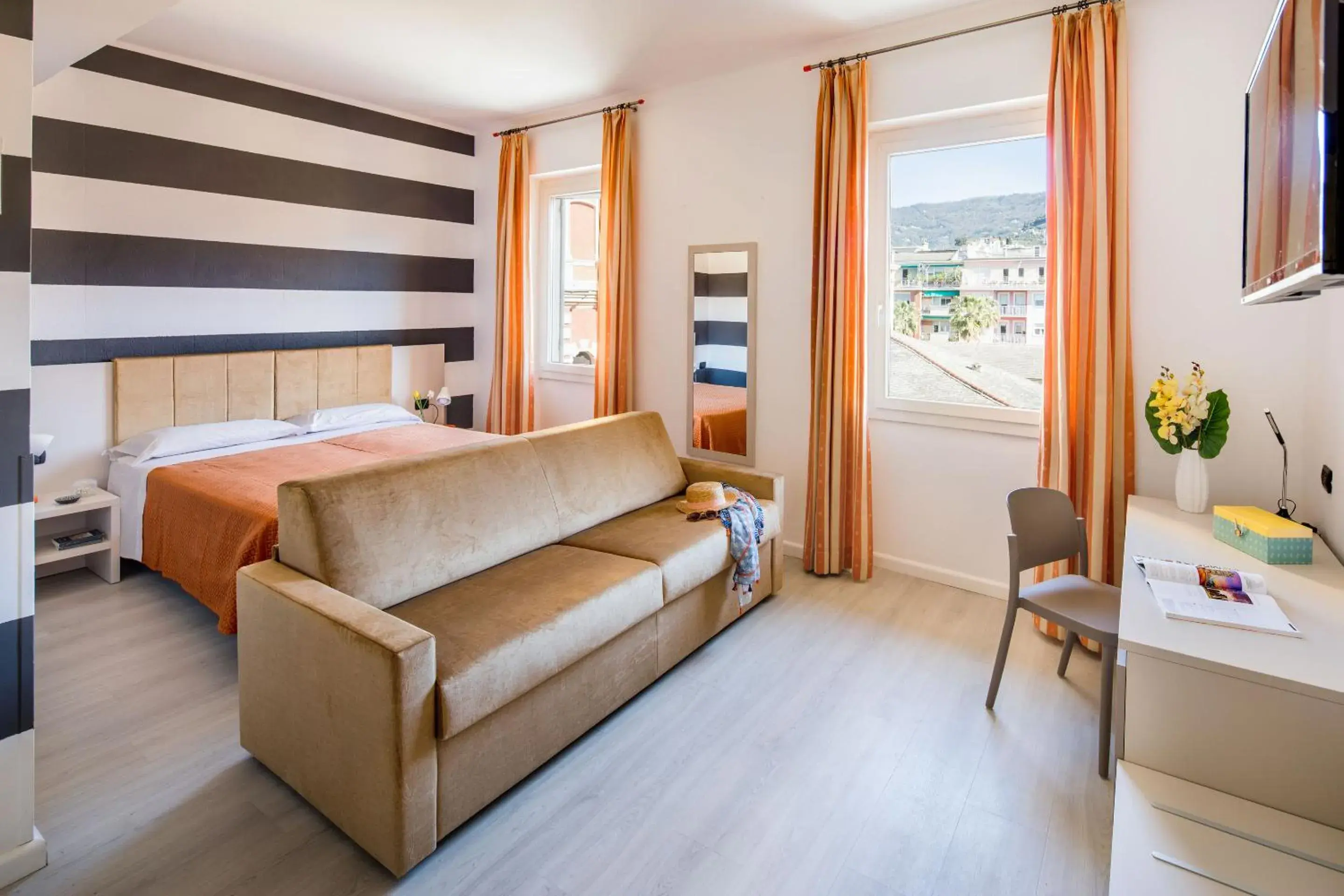 Quadruple Room in Albergo La Piazzetta Quadruple Room in Albergo La Piazzetta