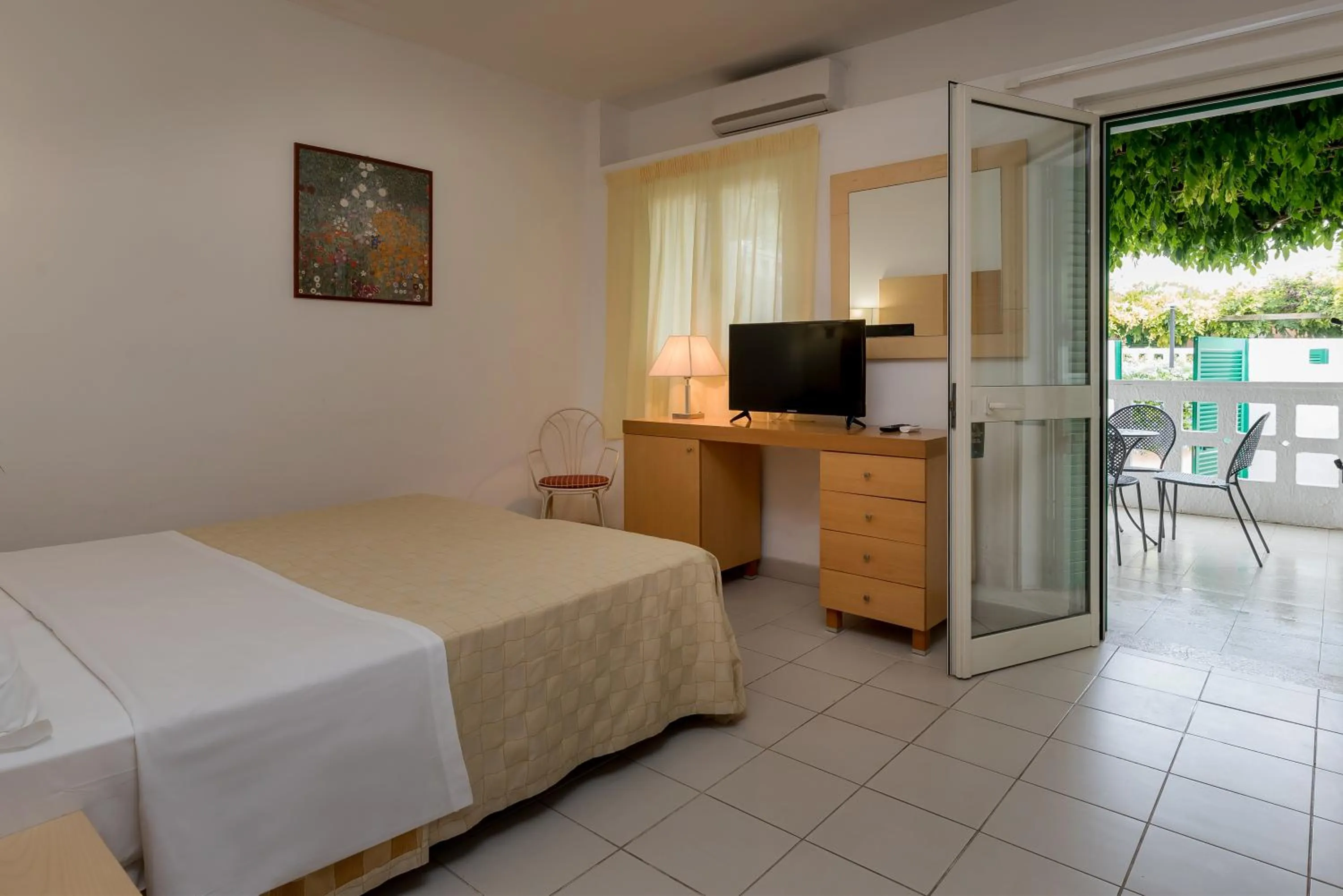 Bedroom in Hotel Club Village Maritalia