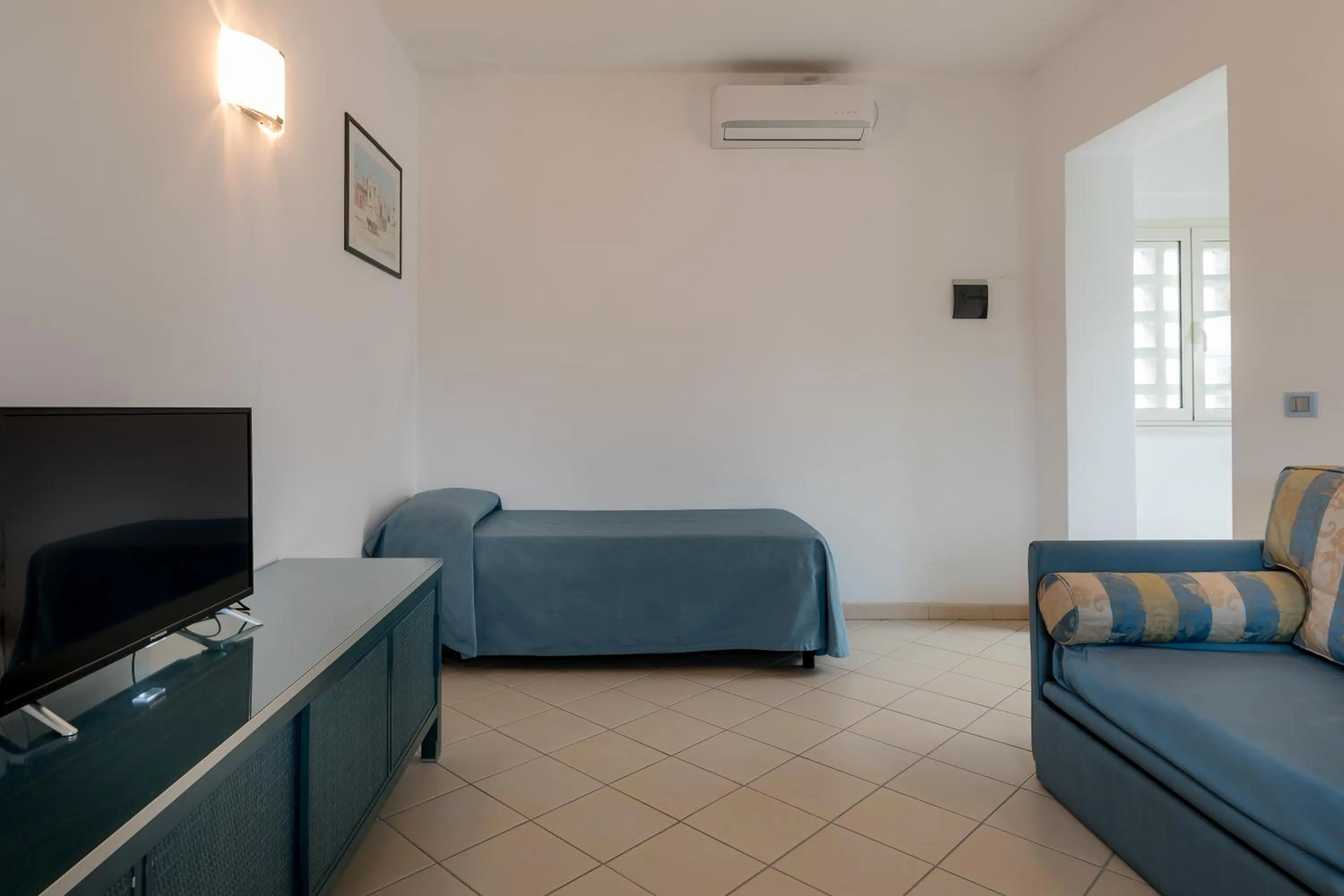 Bed in Hotel Club Village Maritalia