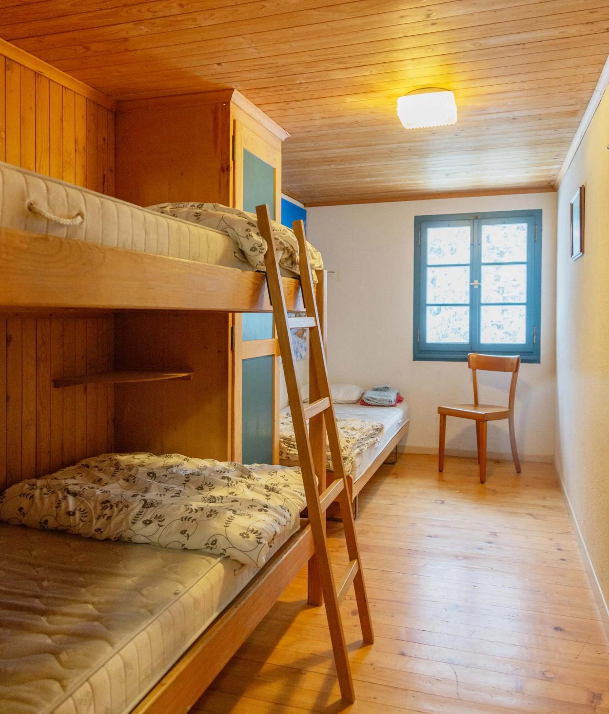 Bed in Kunst- und Naturfreundehaus Brünig