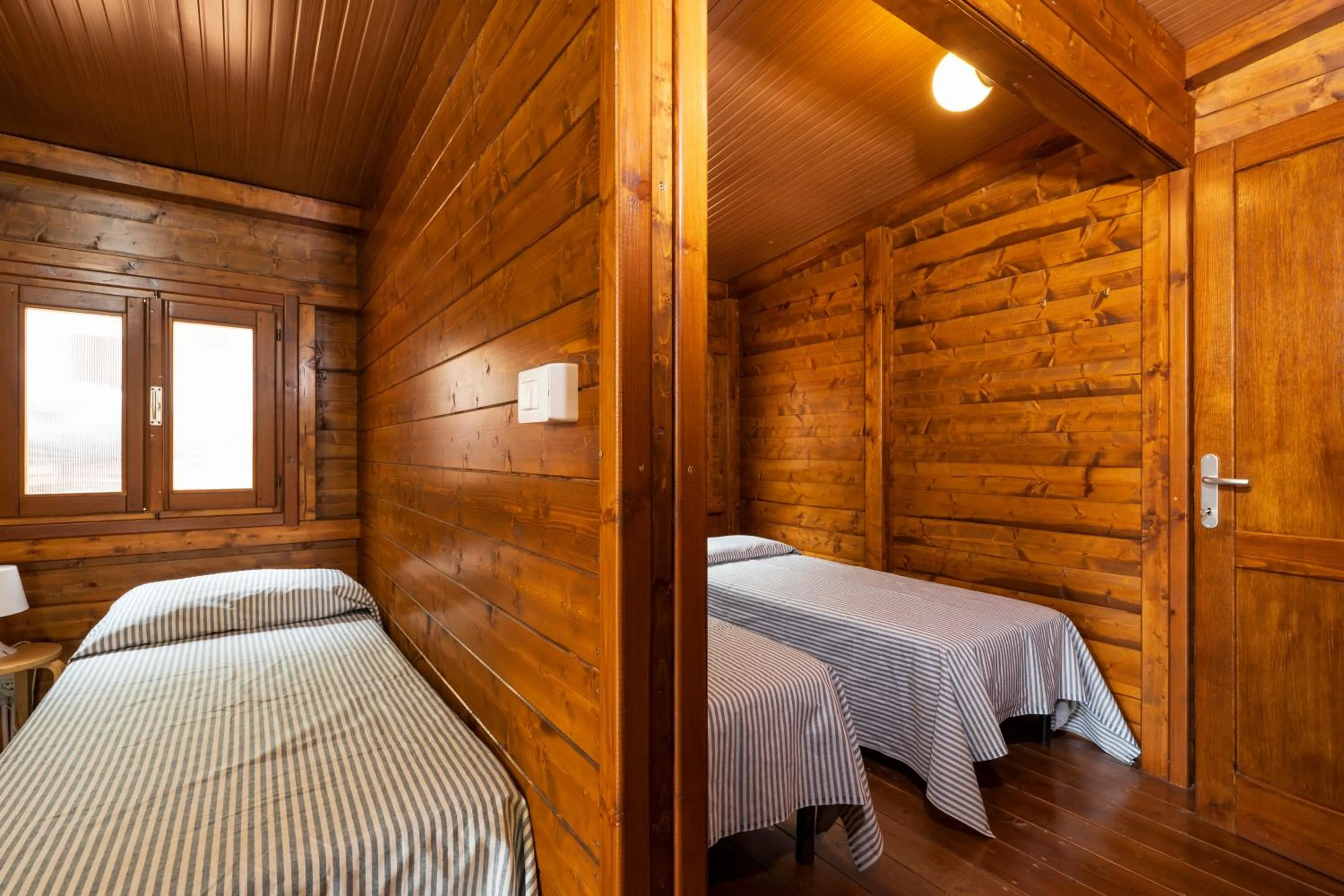 Bed in Villaggio Camping Calapineta