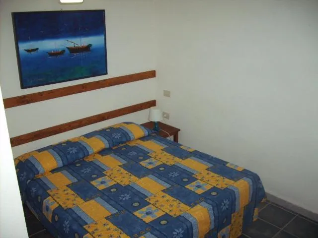 Bedroom, Bed in Villaggio Camping Calapineta