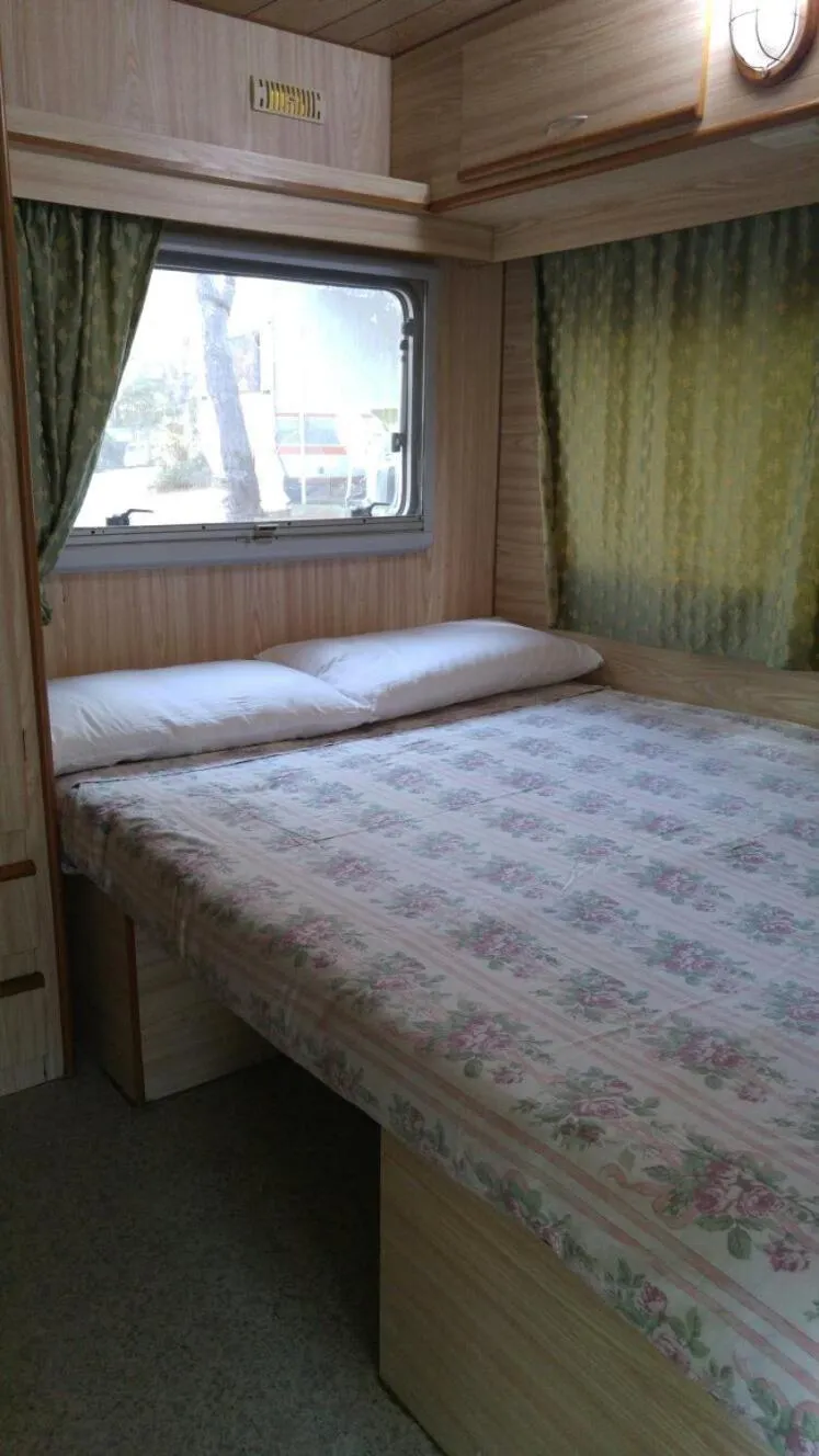 Bed in Villaggio Camping Calapineta