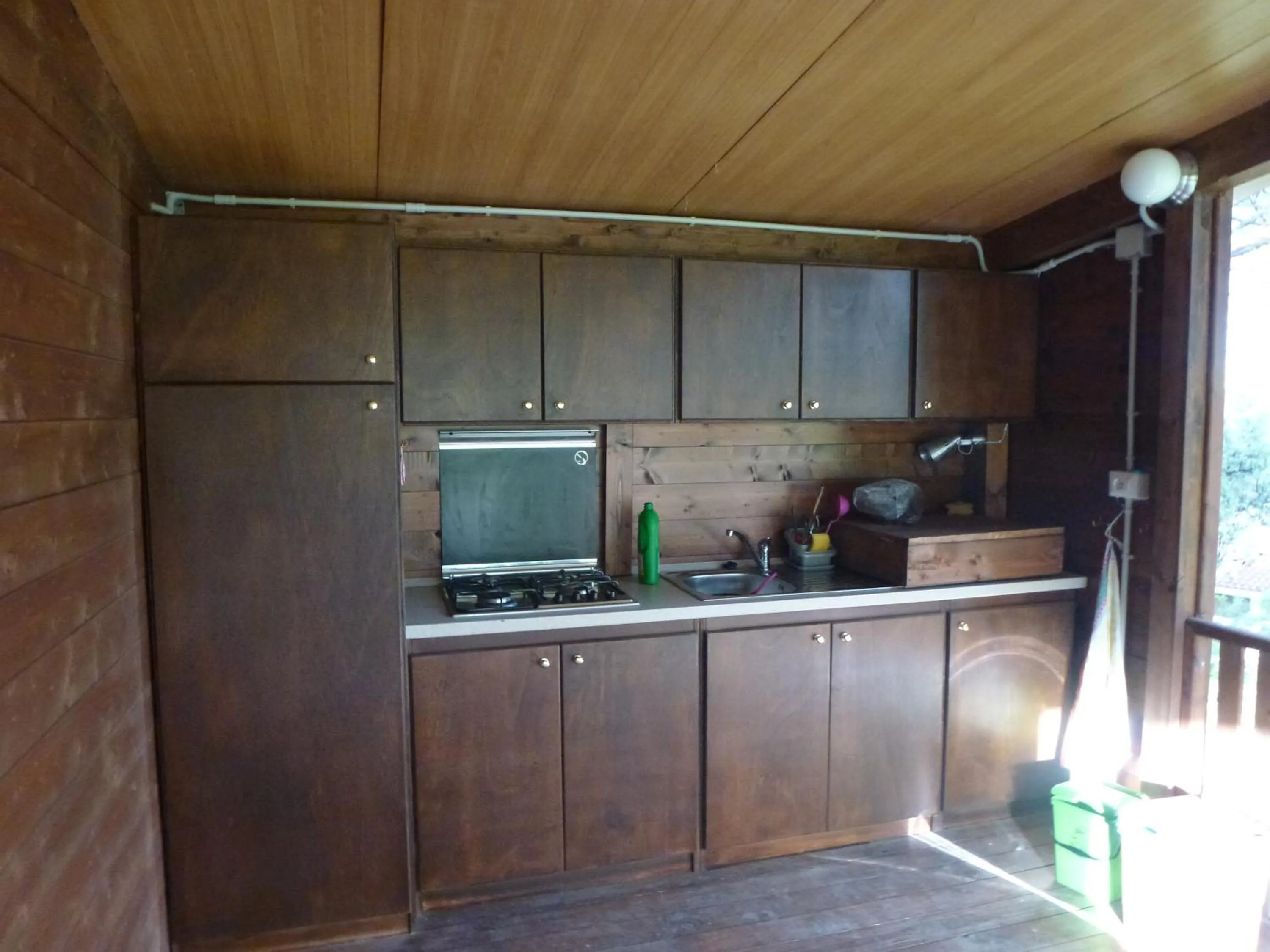 Kitchen or kitchenette in Villaggio Camping Calapineta