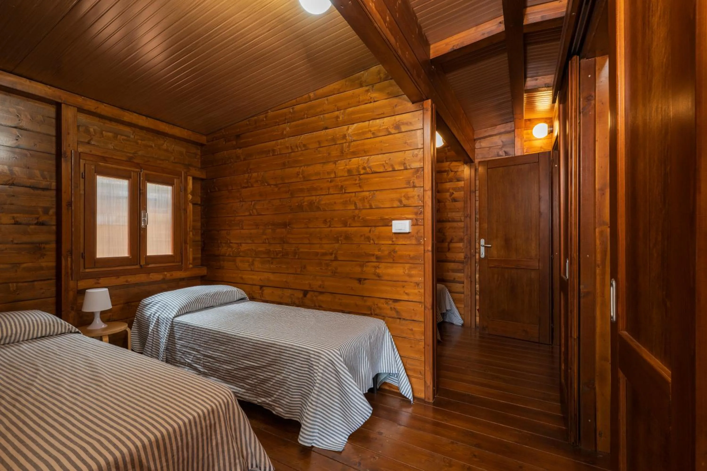 Bed in Villaggio Camping Calapineta