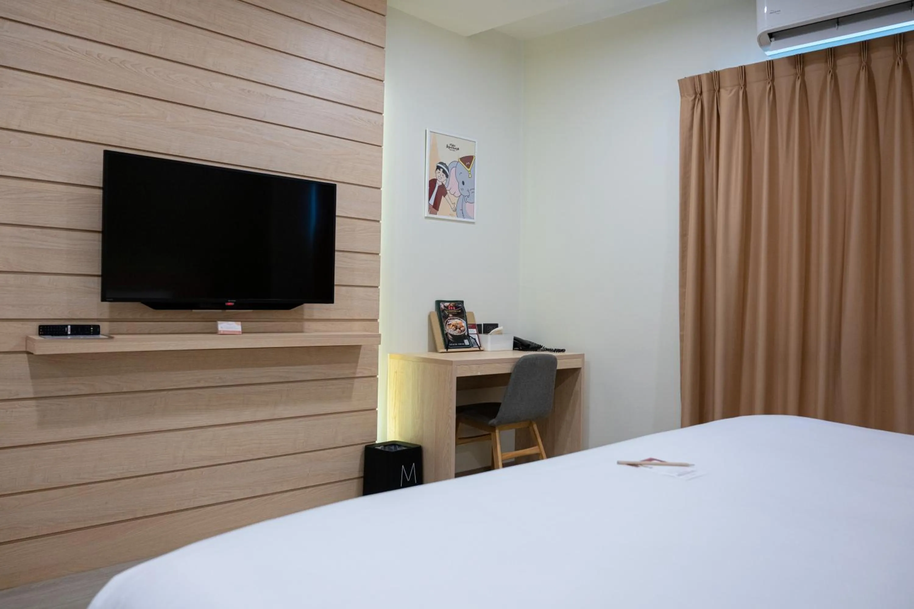 Bed in Mayuu Ayutthaya Hotel