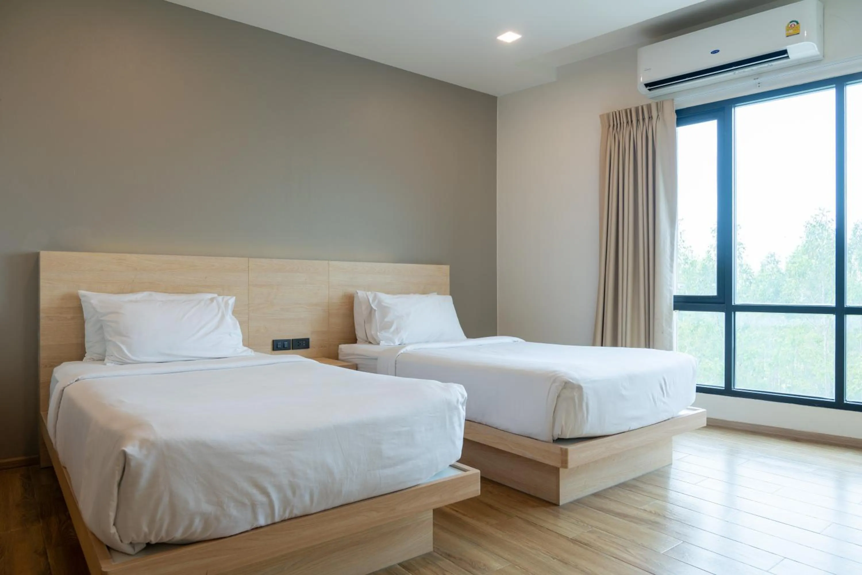 Bed in Mayuu Ayutthaya Hotel