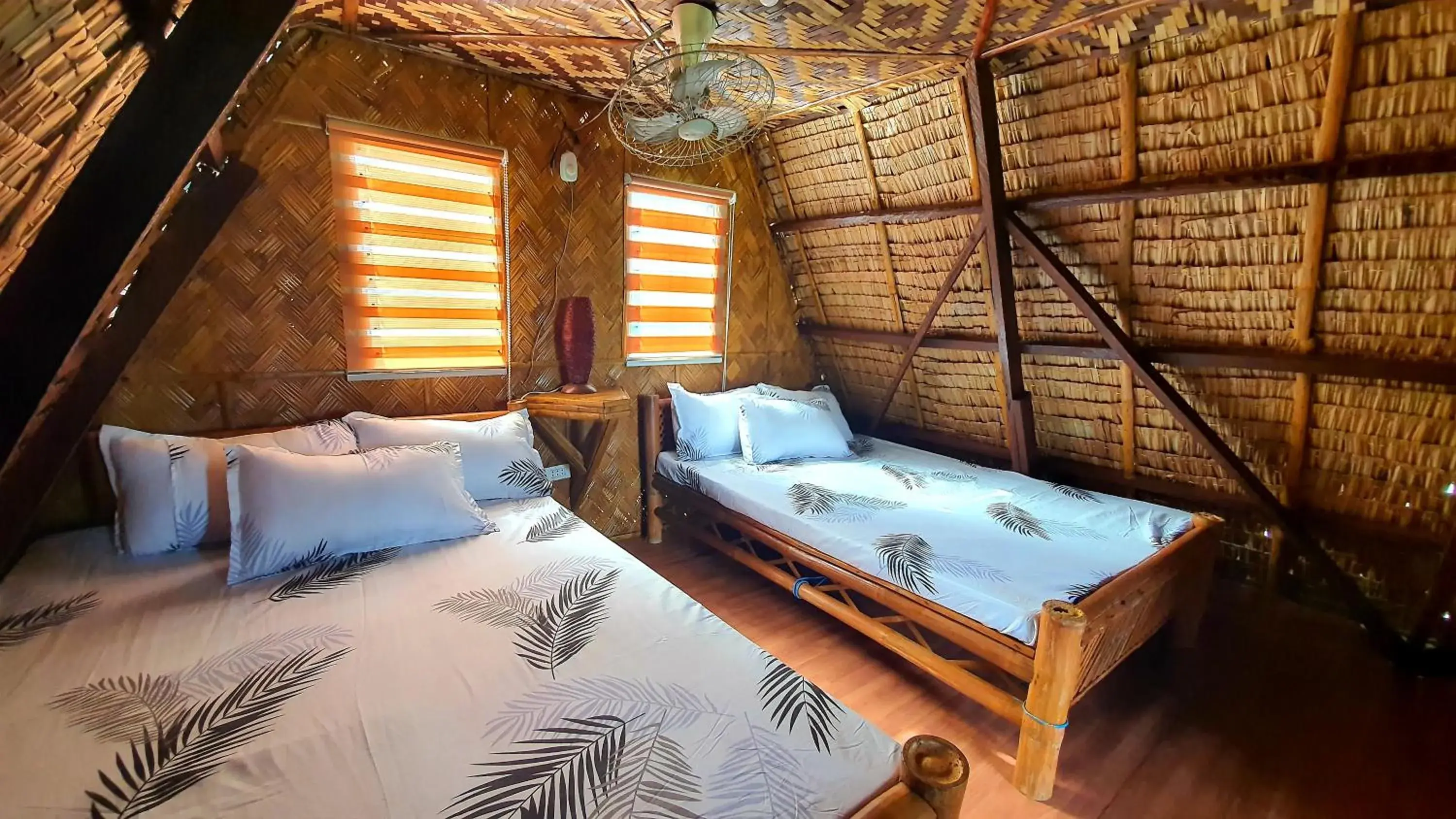 Bed in Calatagan's Bahay Kubo - with Beach Access Bed in Calatagan's Bahay Kubo - with Beach Access