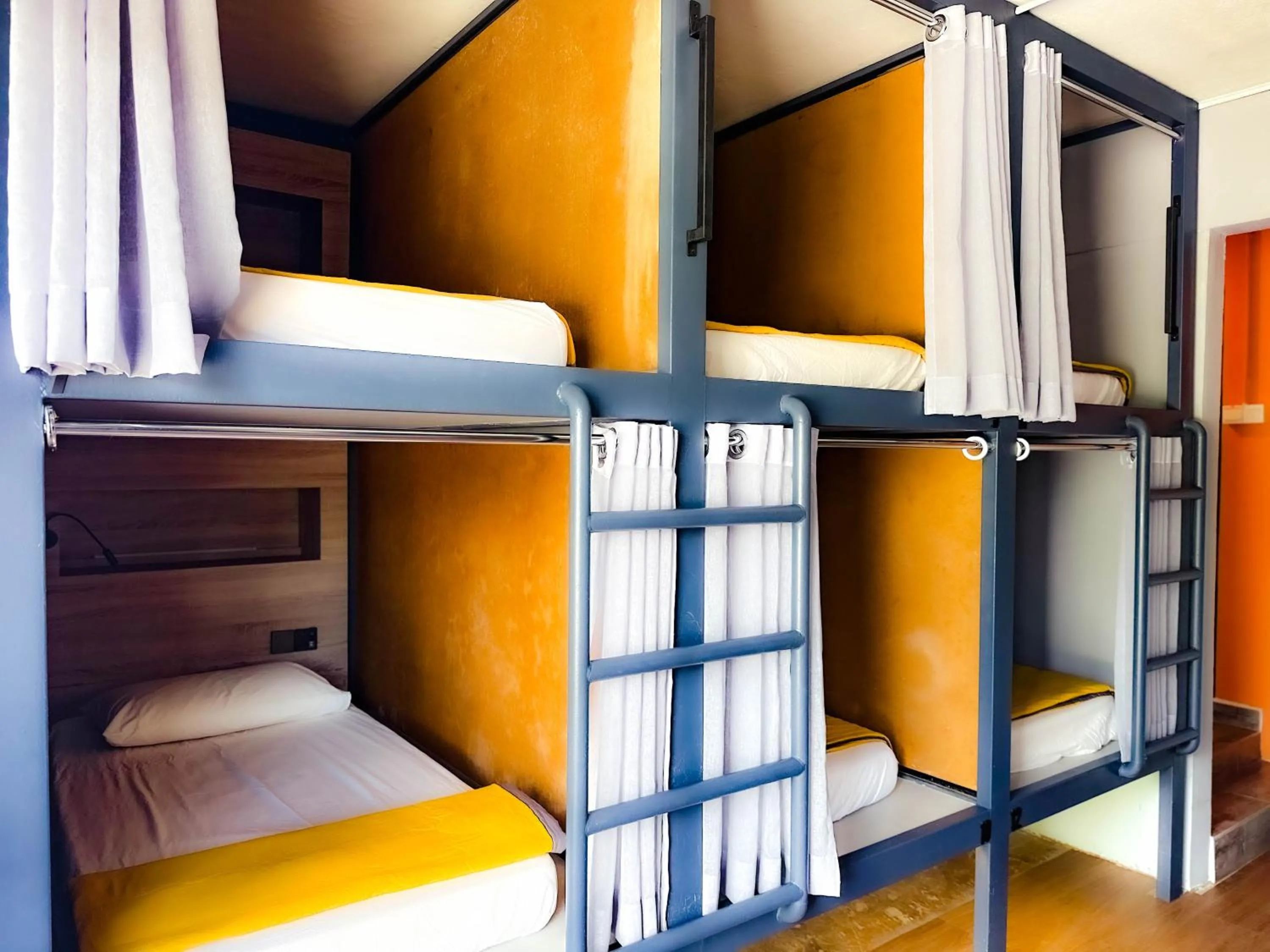 Bed in Arch Dormitorio Cenang