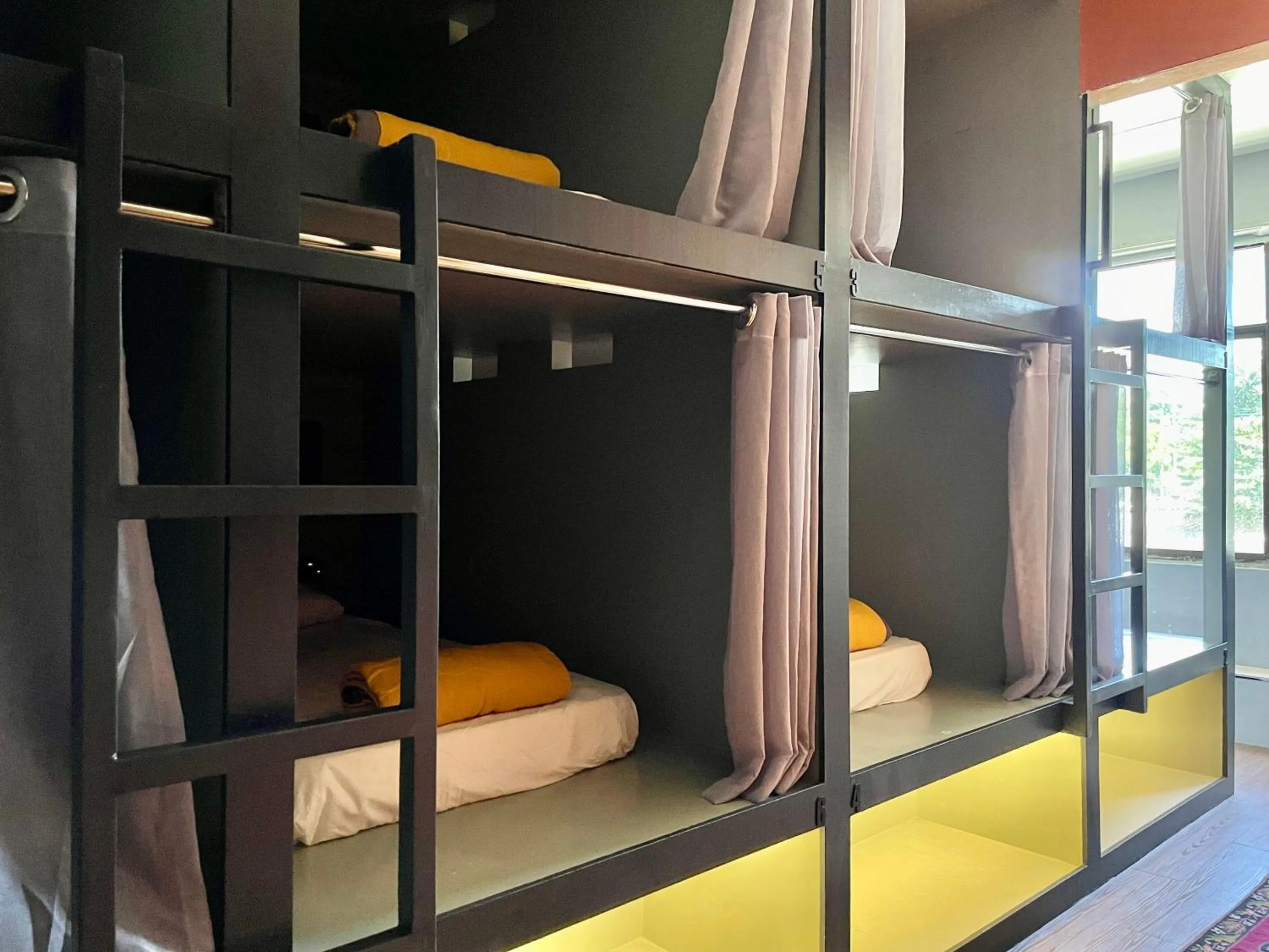 Bed in Arch Dormitorio Cenang