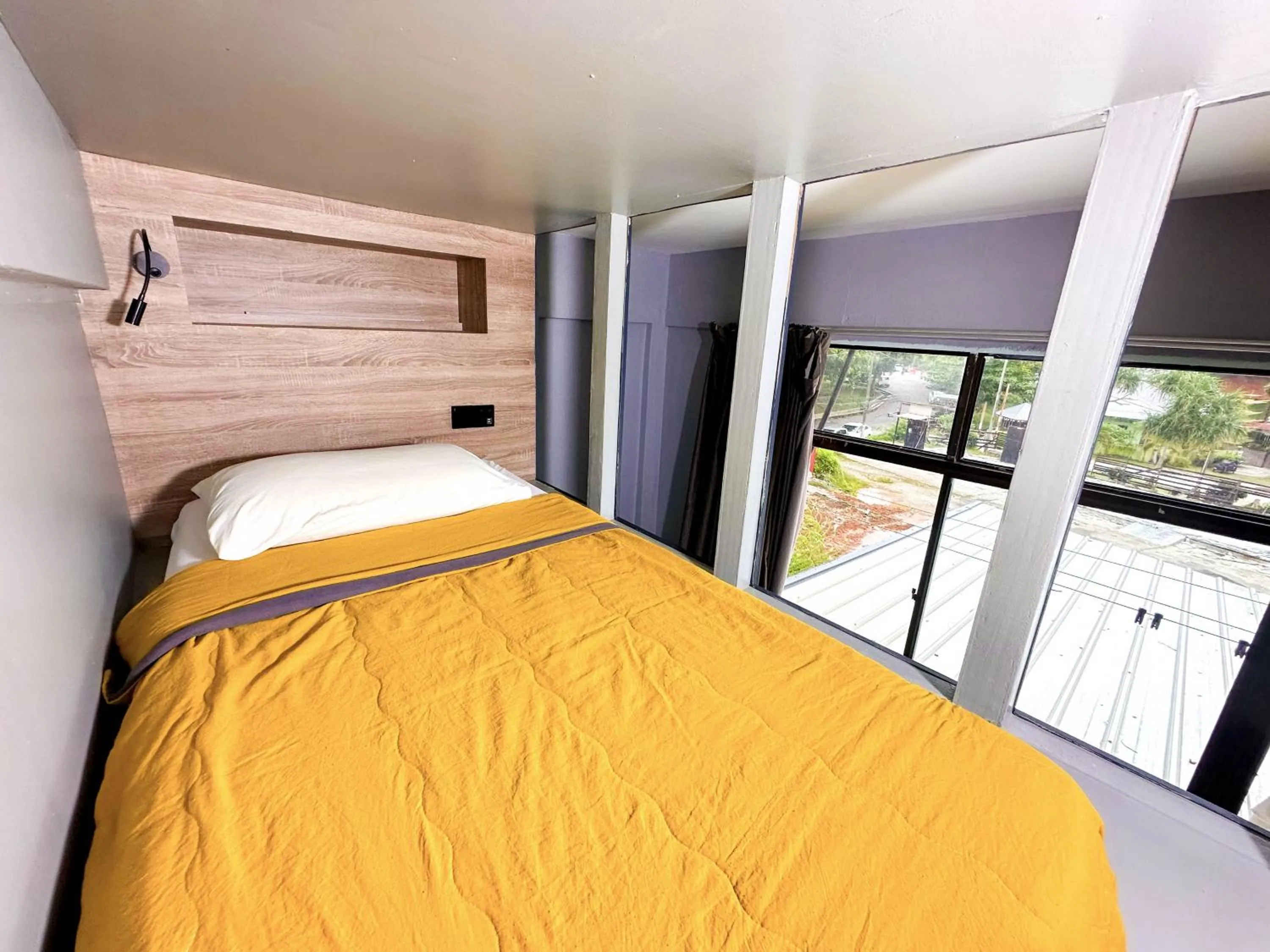 Bed in Arch Dormitorio Cenang