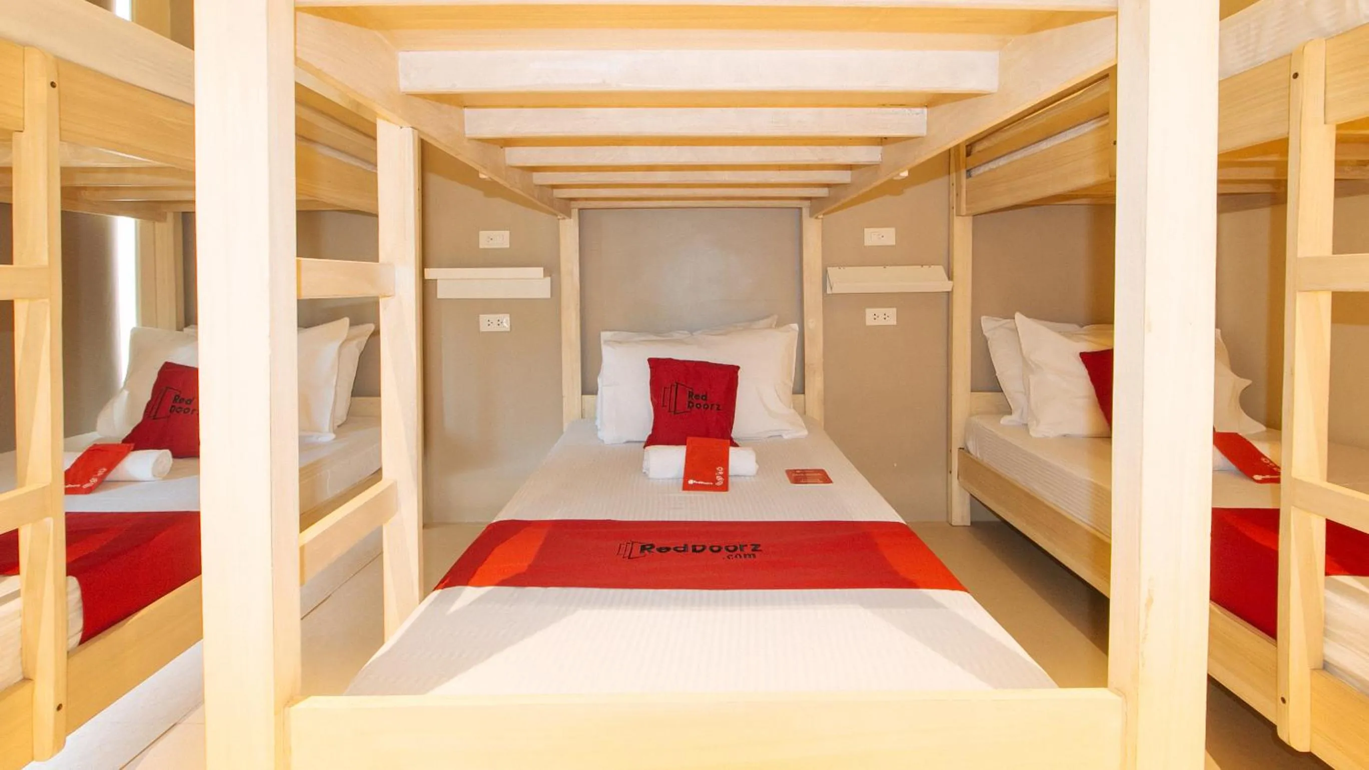 Bed in RedDoorz at Laiya Vivo Hotel Batangas